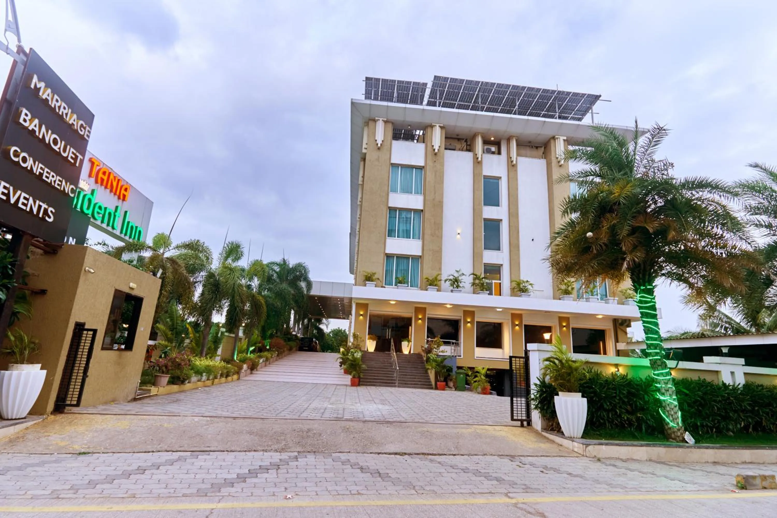 Property building in Tania President Inn