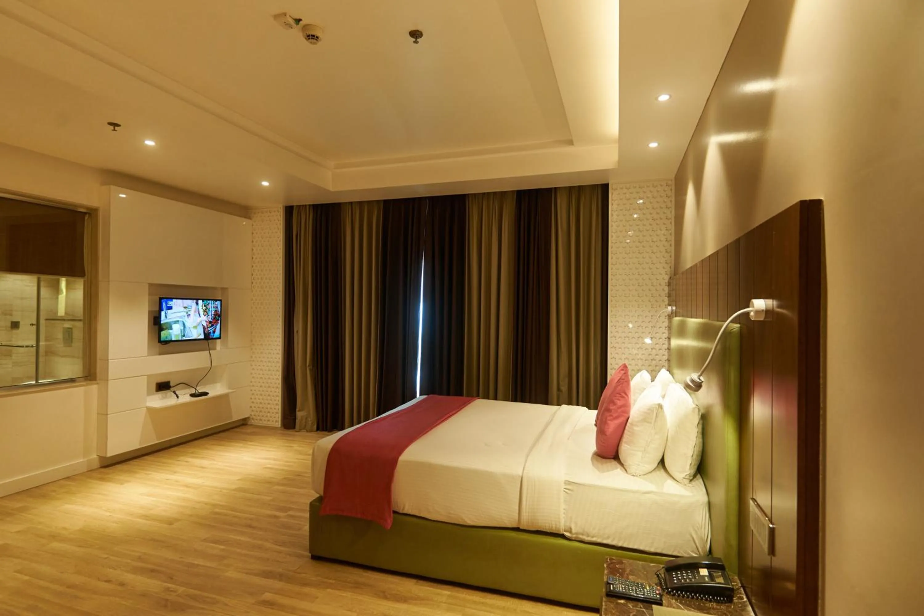 Bed in Tania President Inn