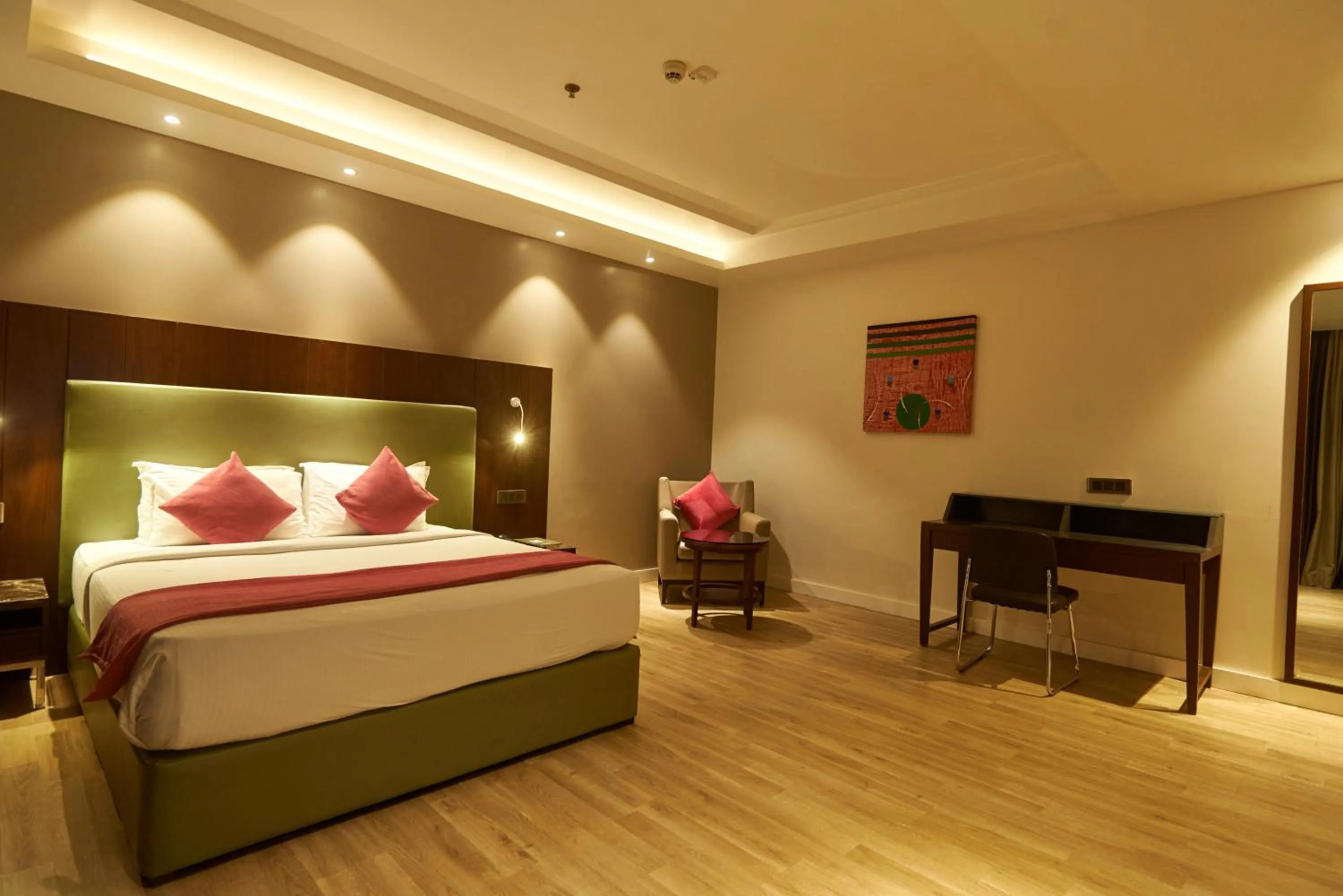 Bed in Tania President Inn