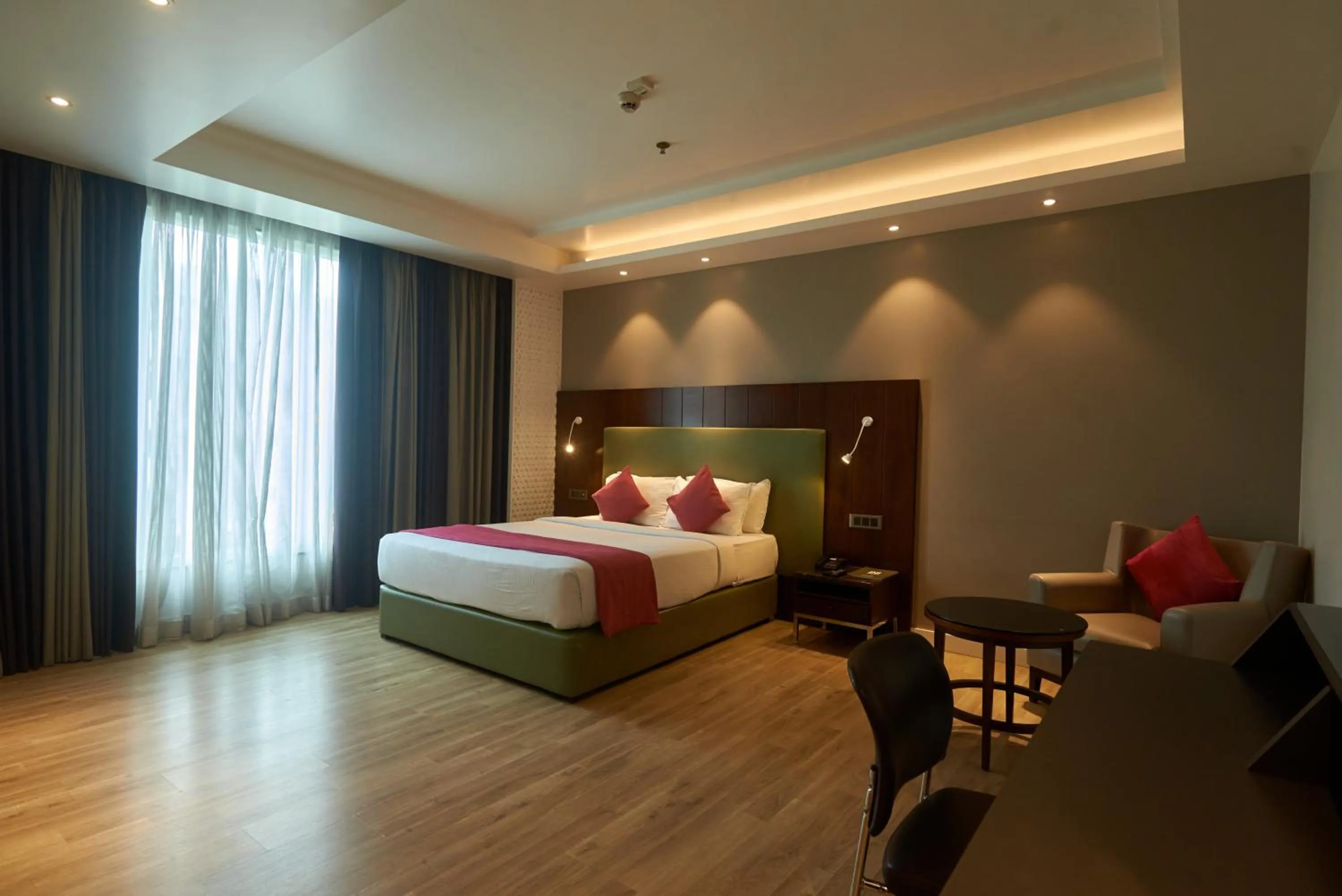 Bed in Tania President Inn