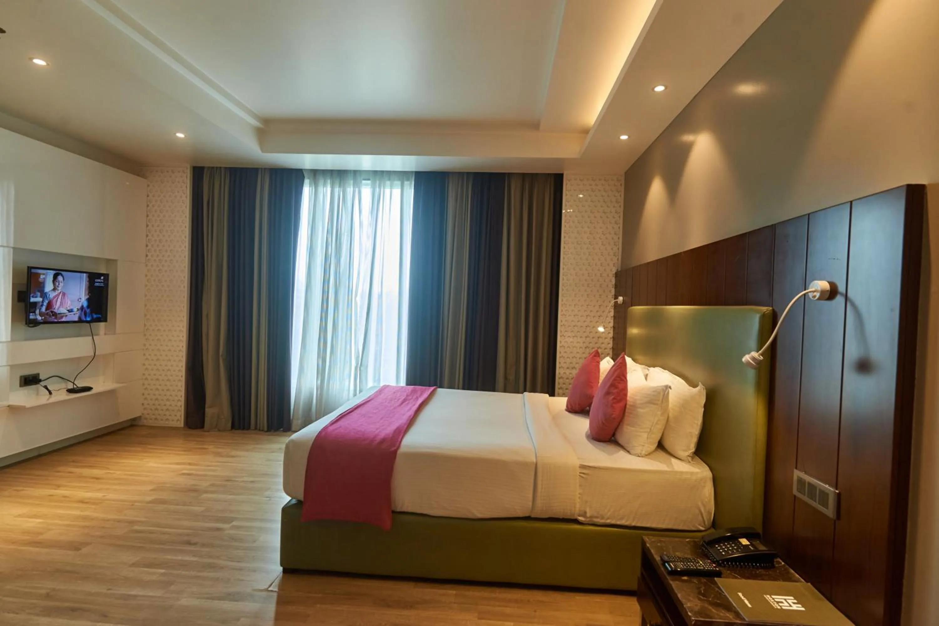 Bed in Tania President Inn