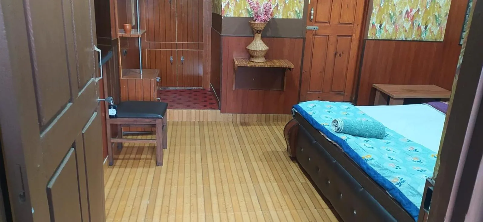 Bed in Heavenwood Heritage Hotel By Urban Inn Resorts