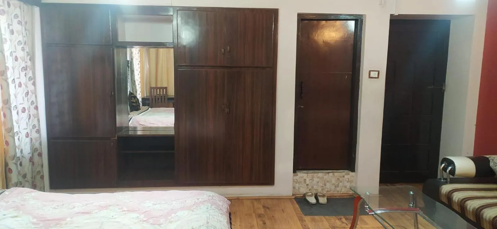 Bed in Heavenwood Heritage Hotel By Urban Inn Resorts