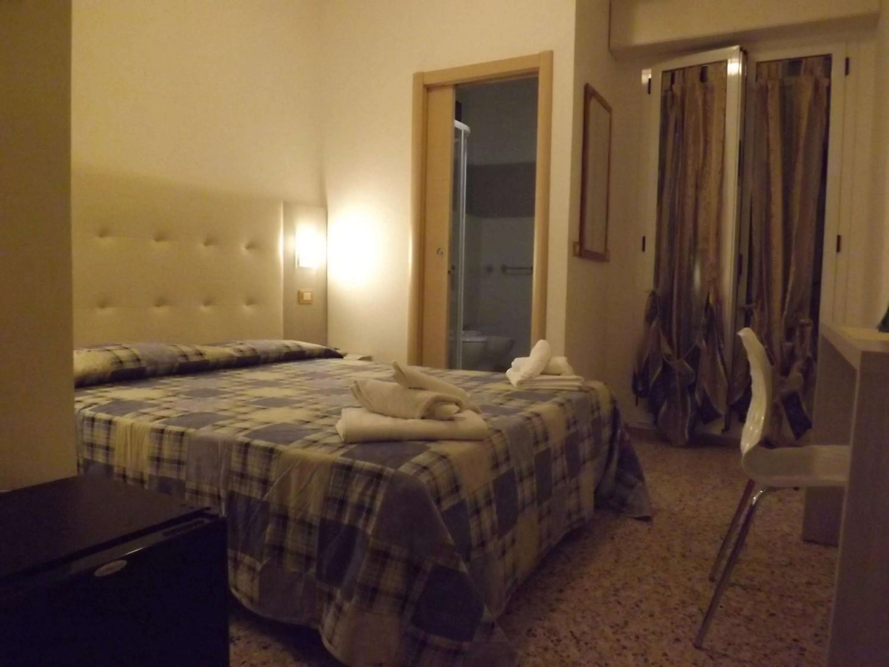 Bed in Hotel Aurora