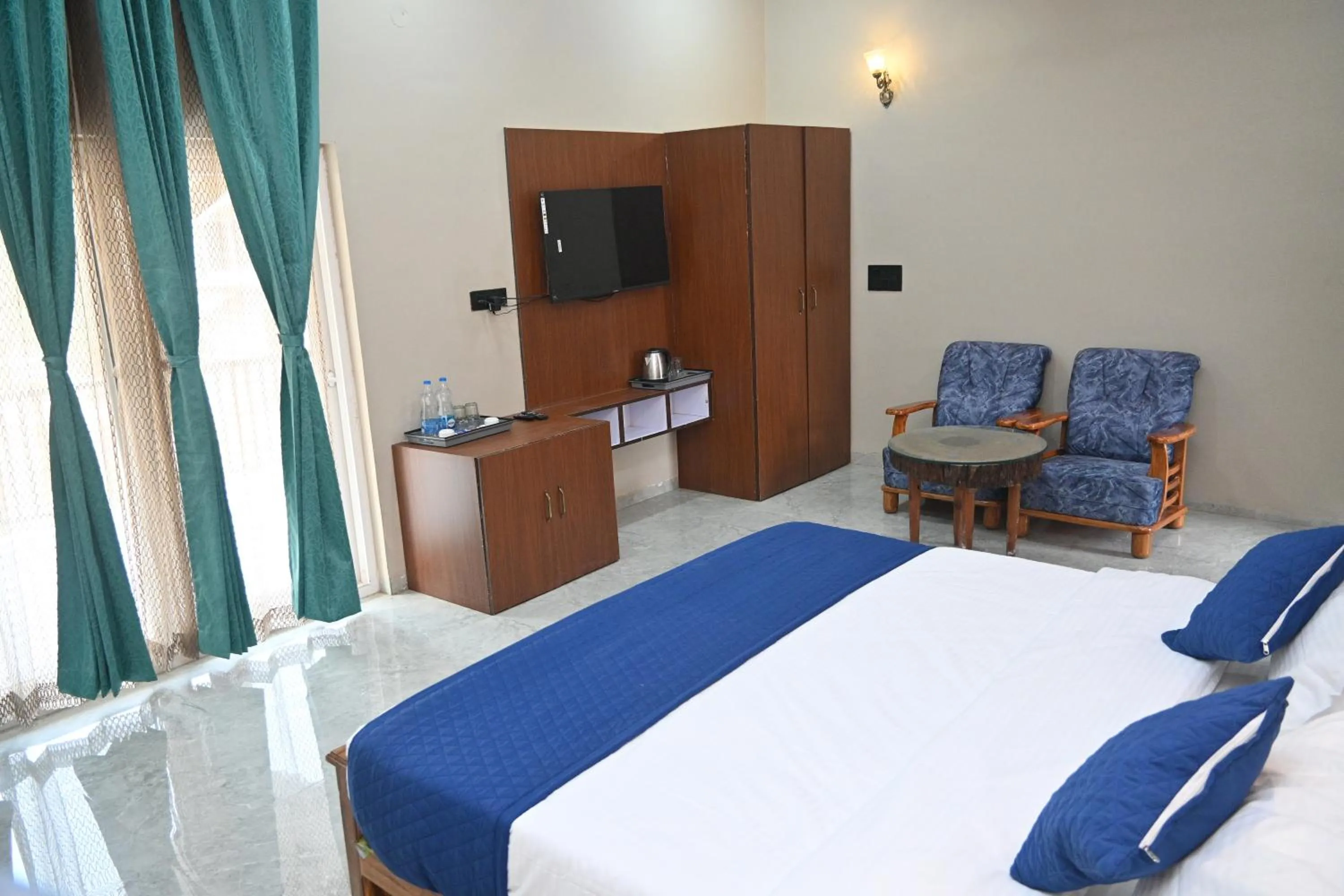 Bed in Bandhavgarh Tiger Resort