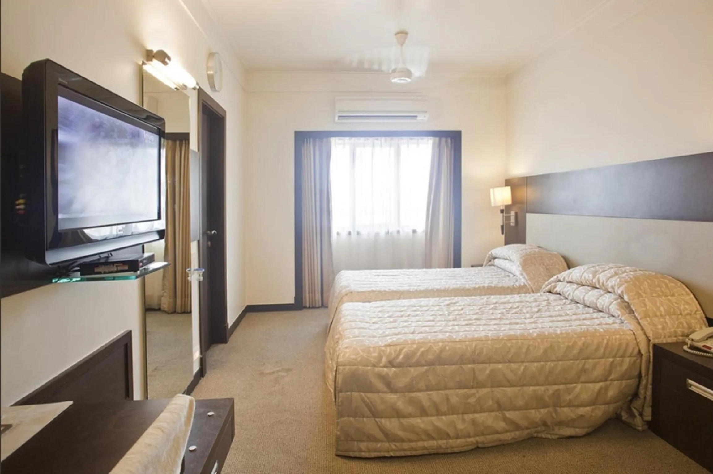 Bed in Hotel Silver Palace