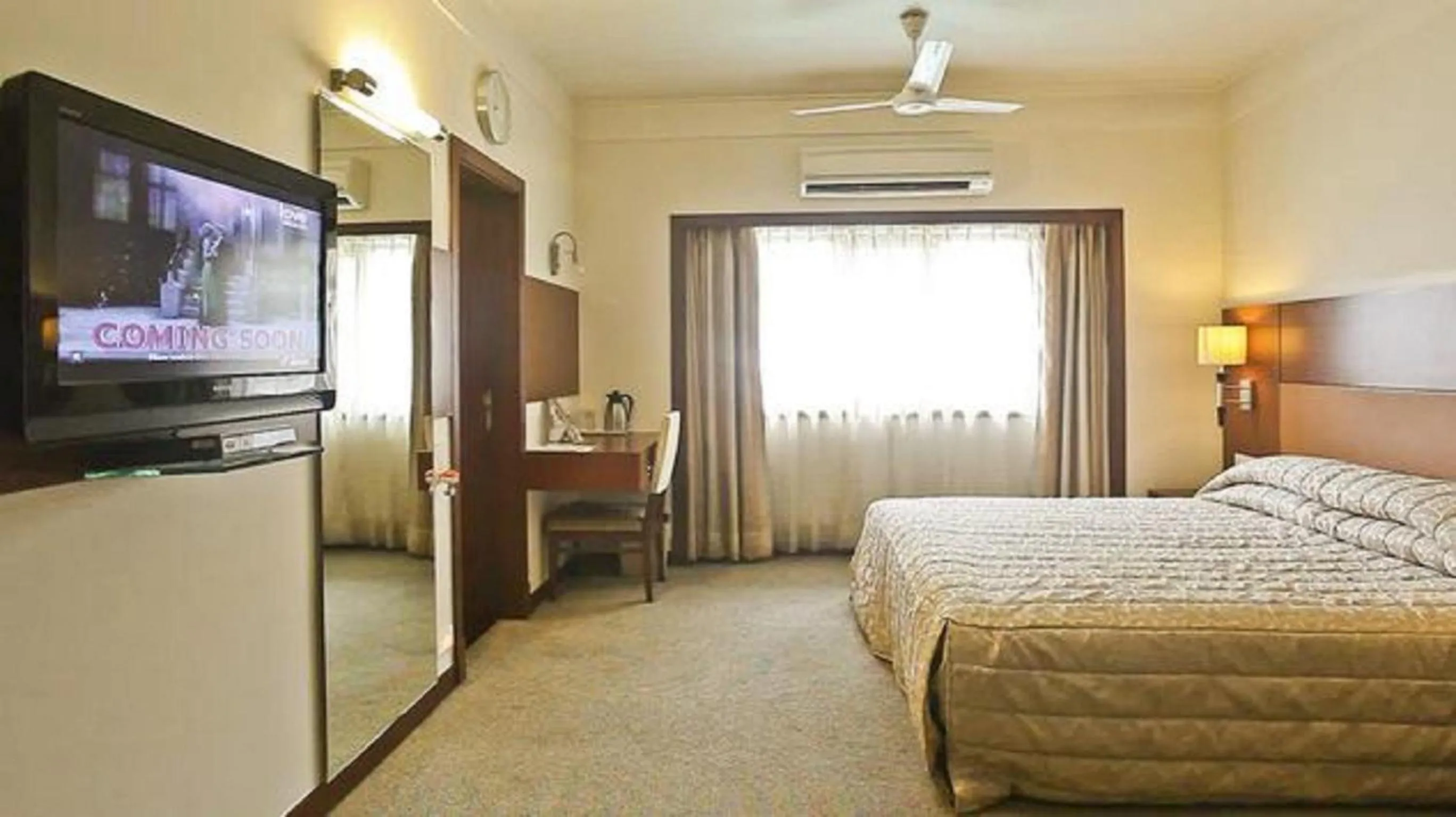 Bed in Hotel Silver Palace