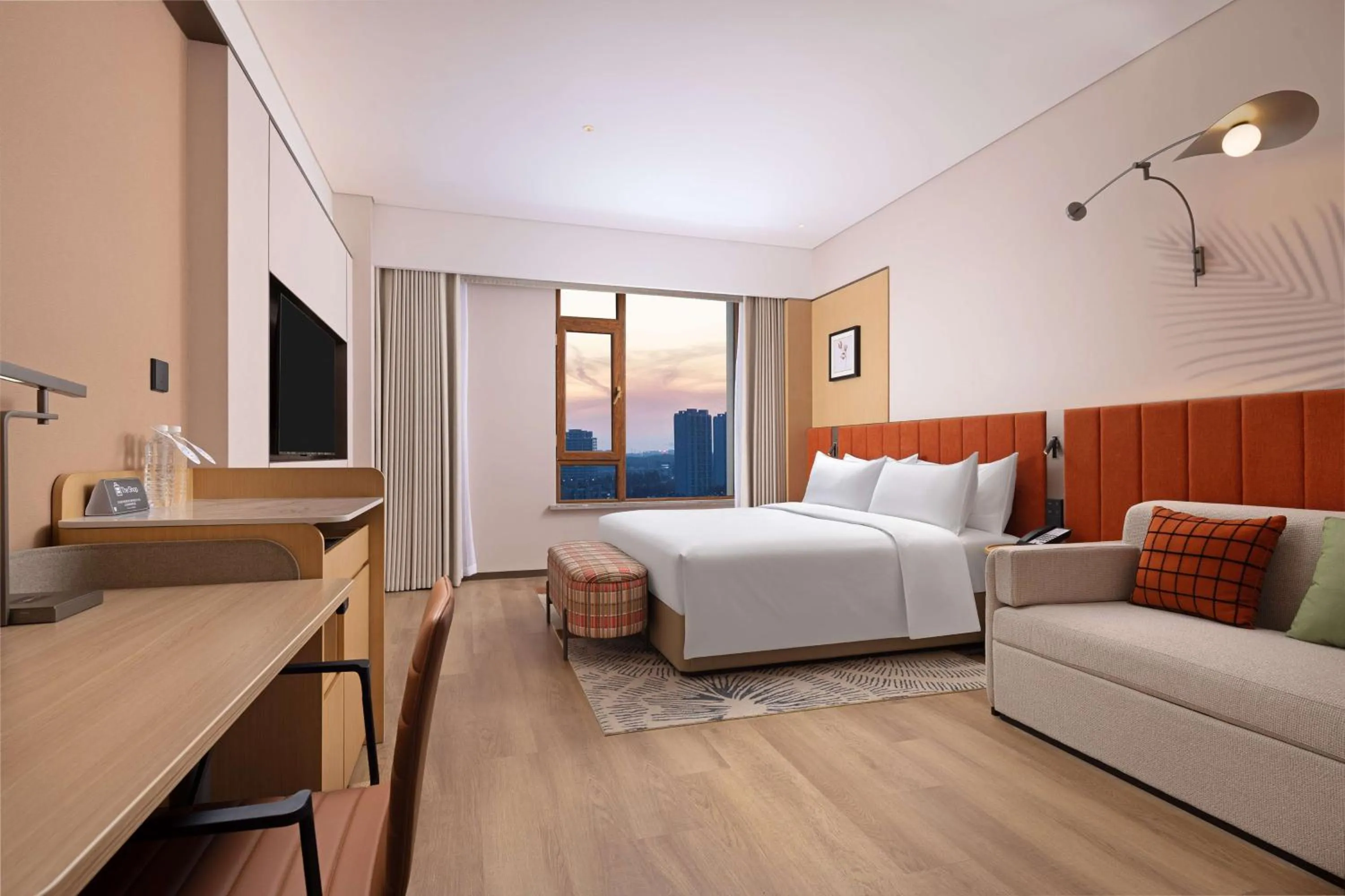 Living room, Bed in Hilton Garden Inn Harbin Haxi