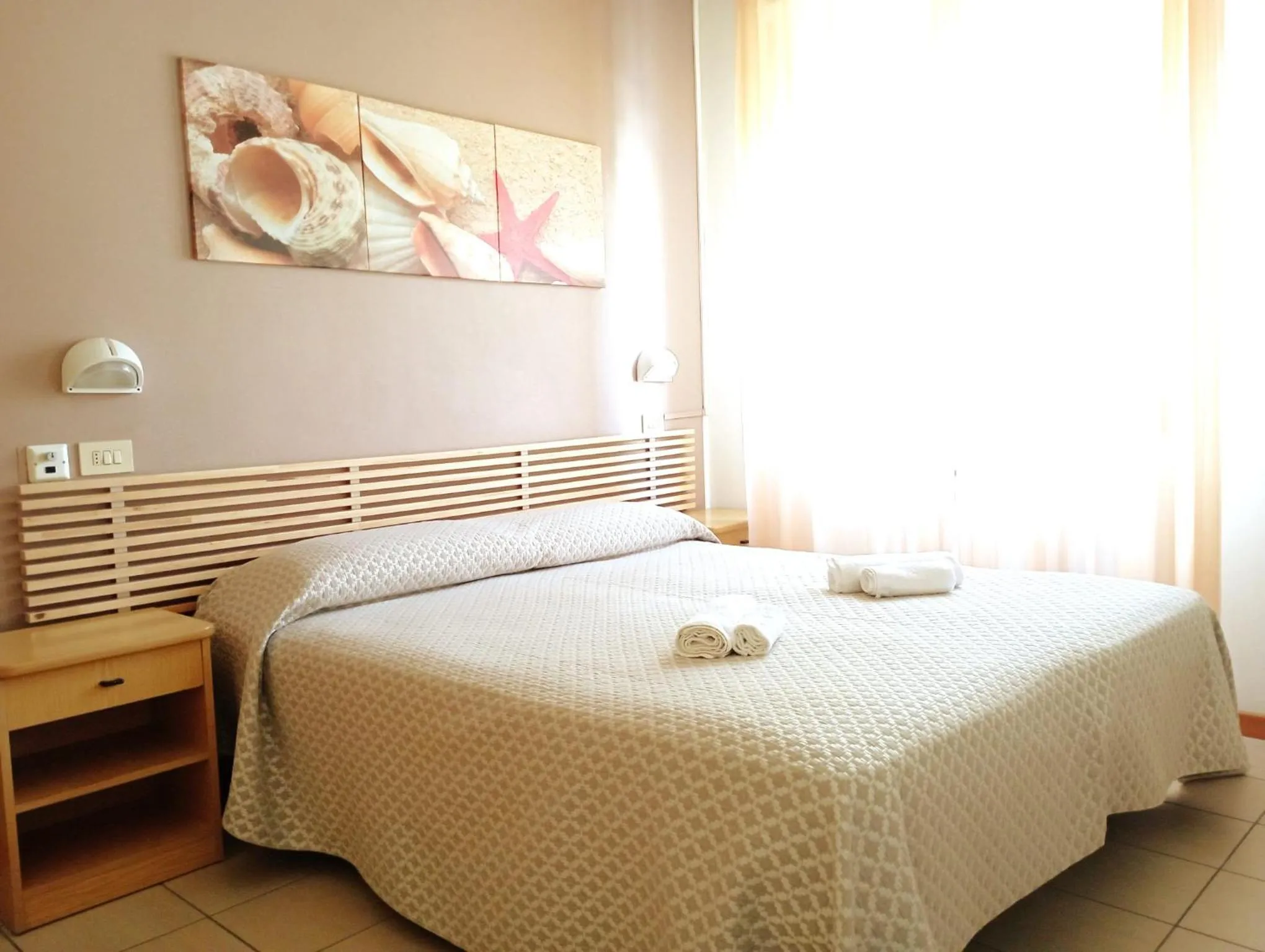 Bed in Villa Gioiosa Beach & Water Park B&B