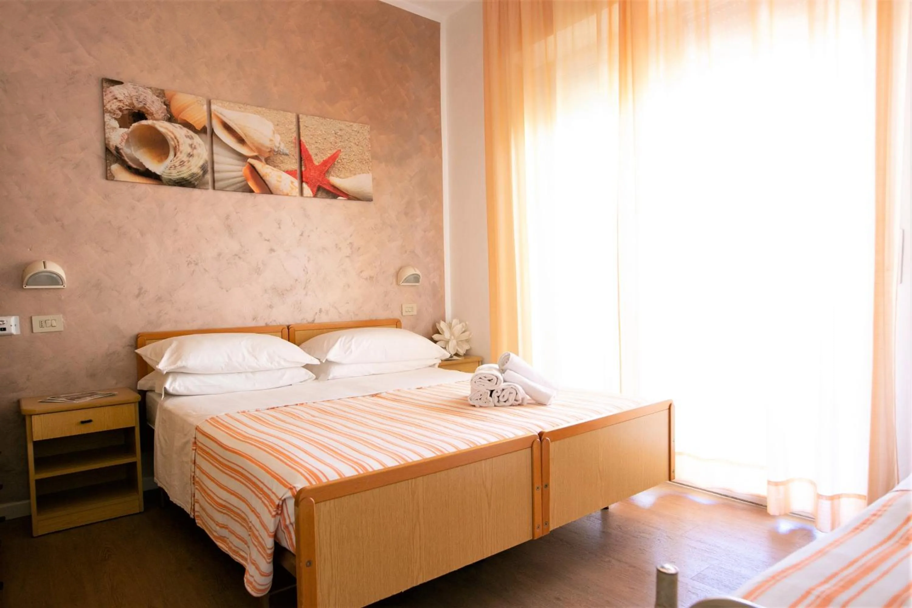 Bed in Villa Gioiosa Beach & Water Park B&B