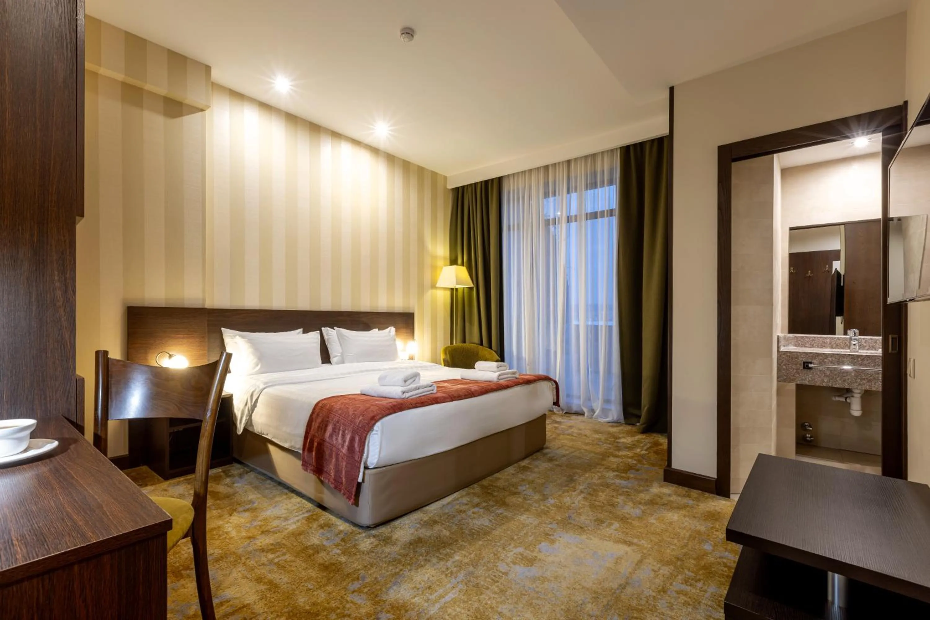 Photo of the whole room, Bed in Citrus Hotel