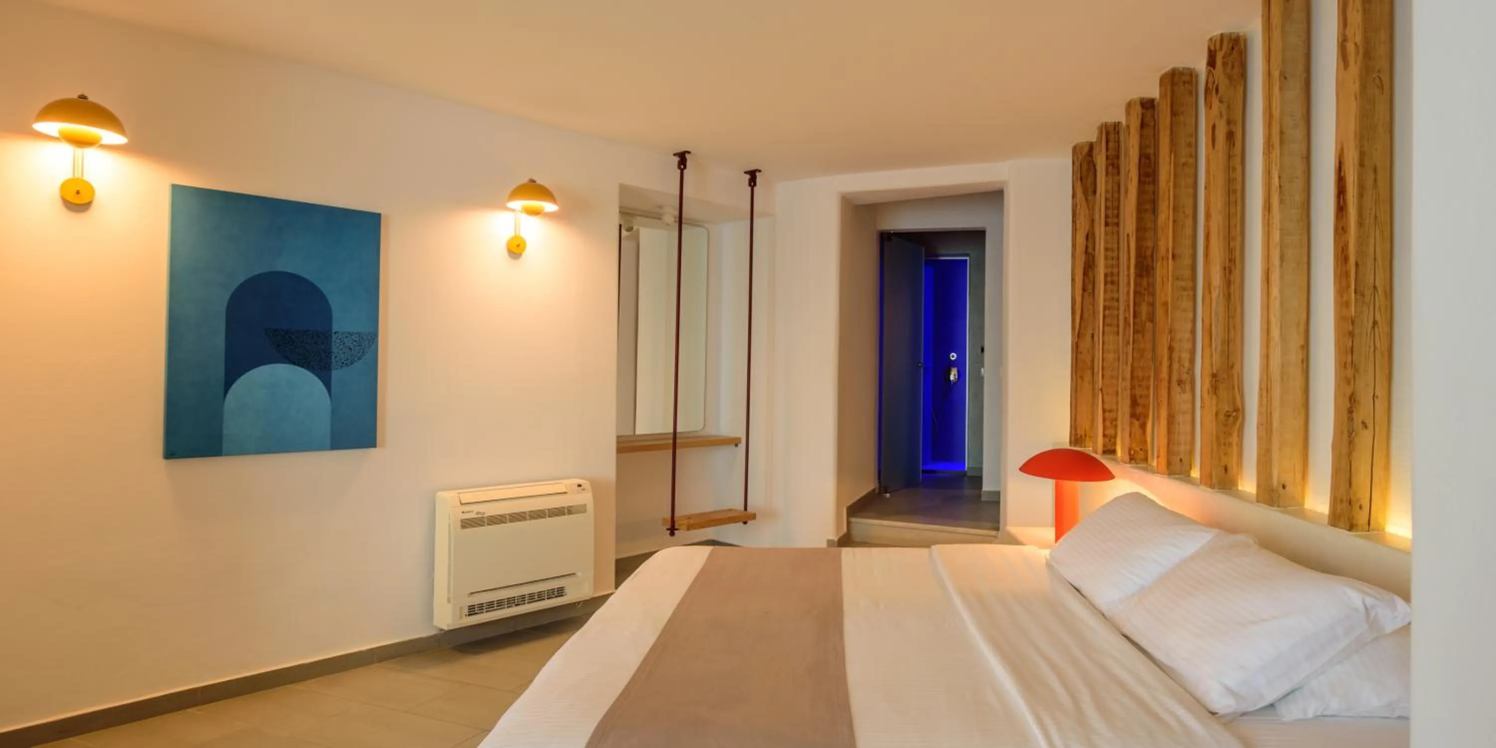 Bed in Neptune Luxury Suites