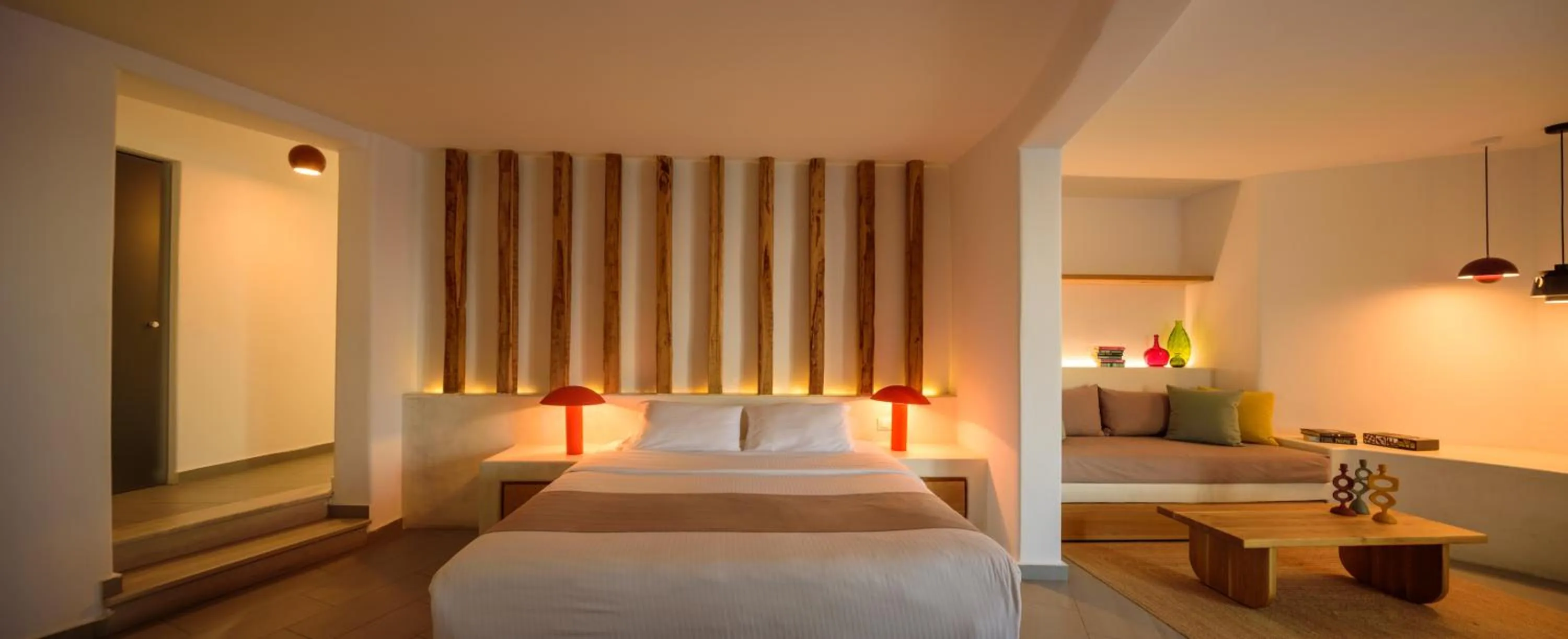 Bed in Neptune Luxury Suites