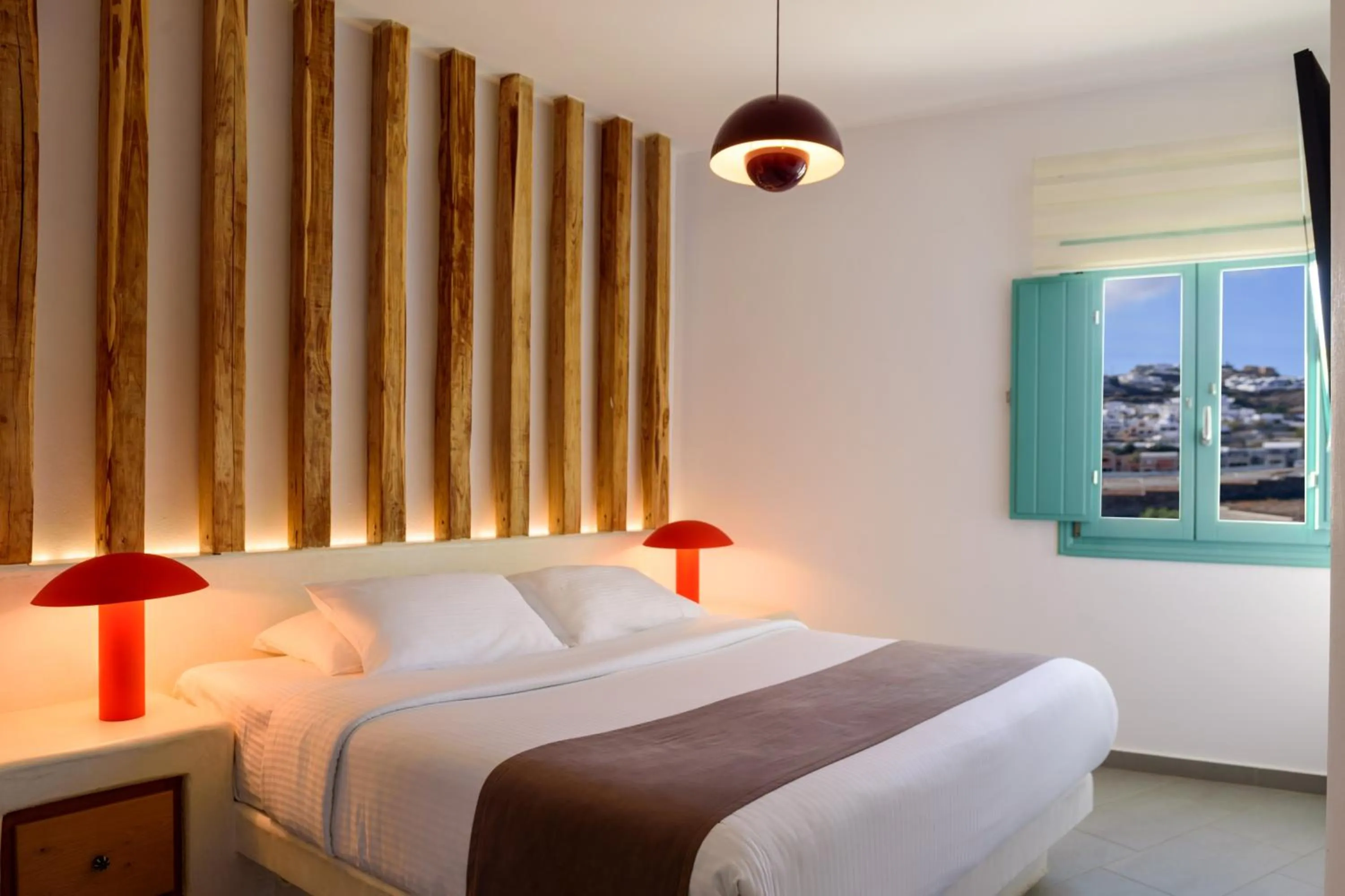 Bed in Neptune Luxury Suites