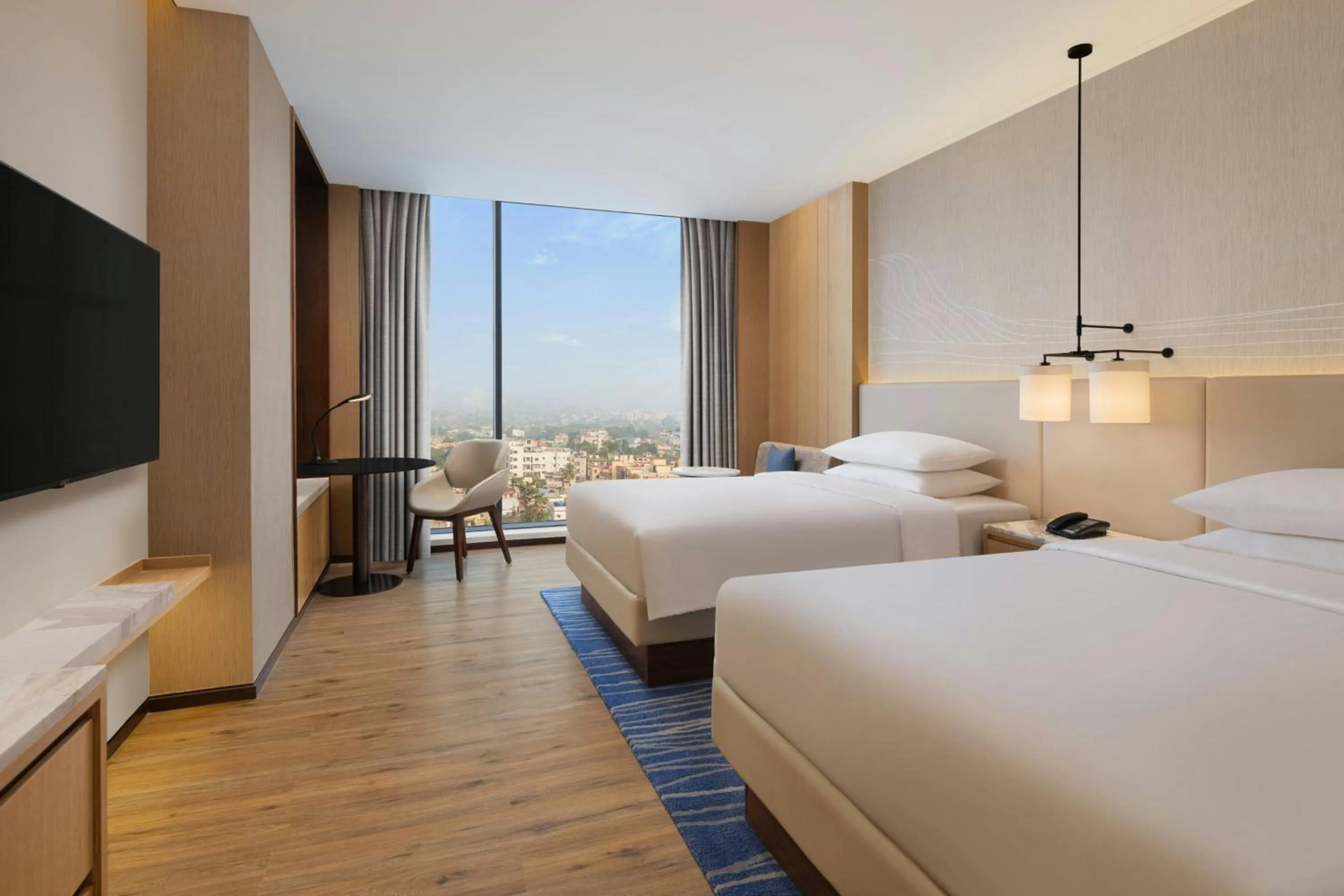 Photo of the whole room, Bed in Courtyard by Marriott Ranchi