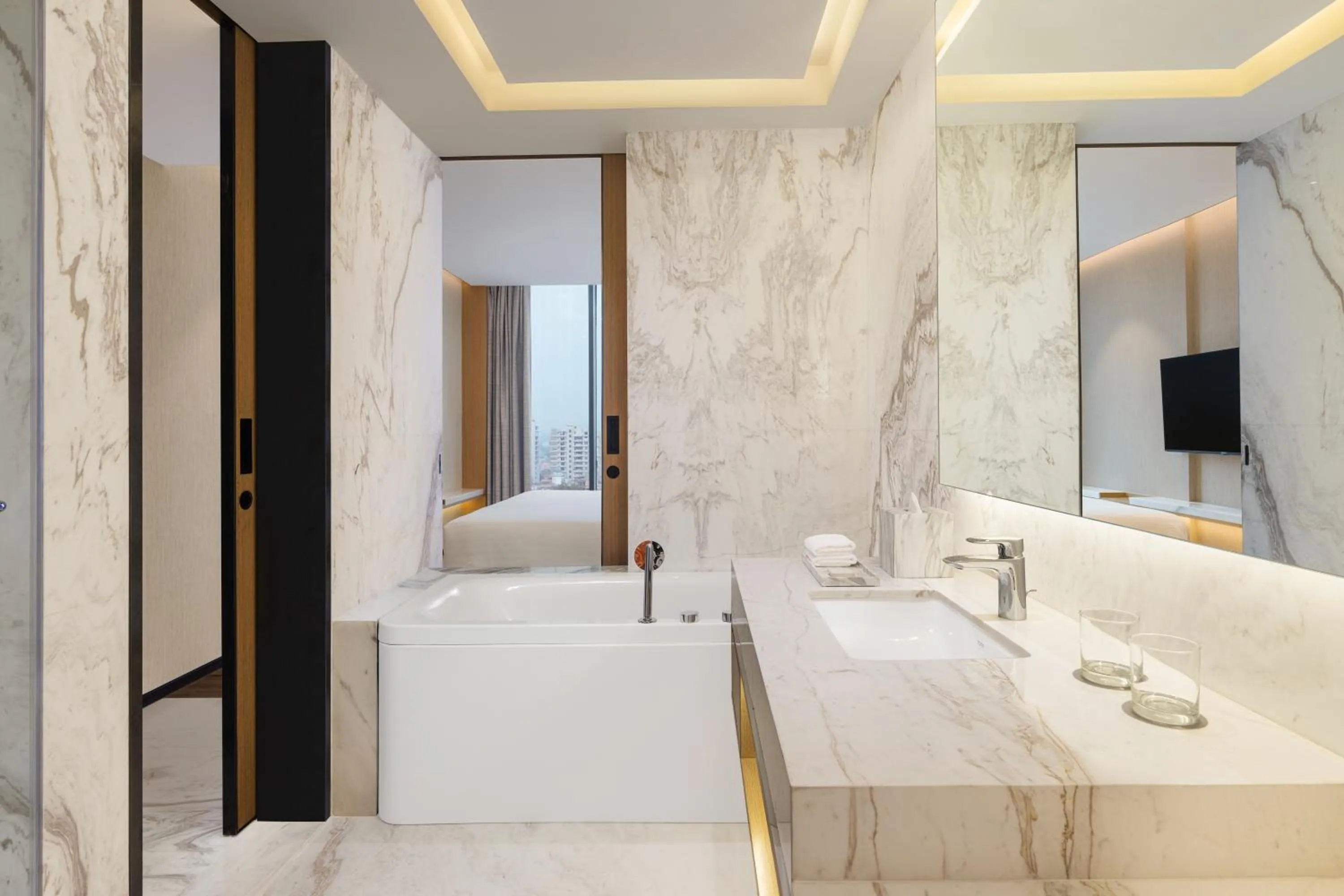 Bathroom, Bed in Courtyard by Marriott Ranchi