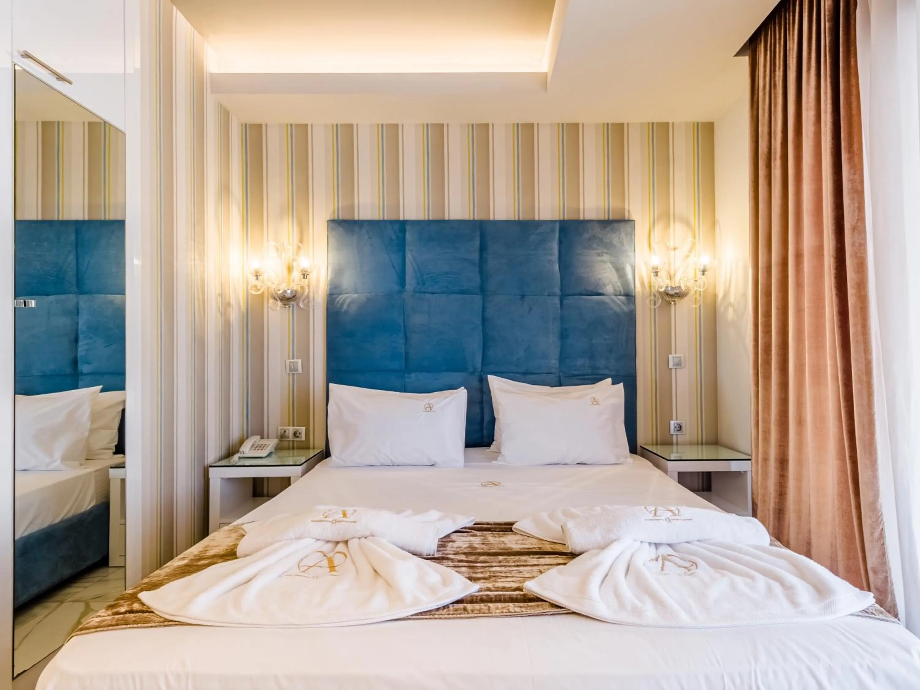 Bed in Alpha Luxury Suites