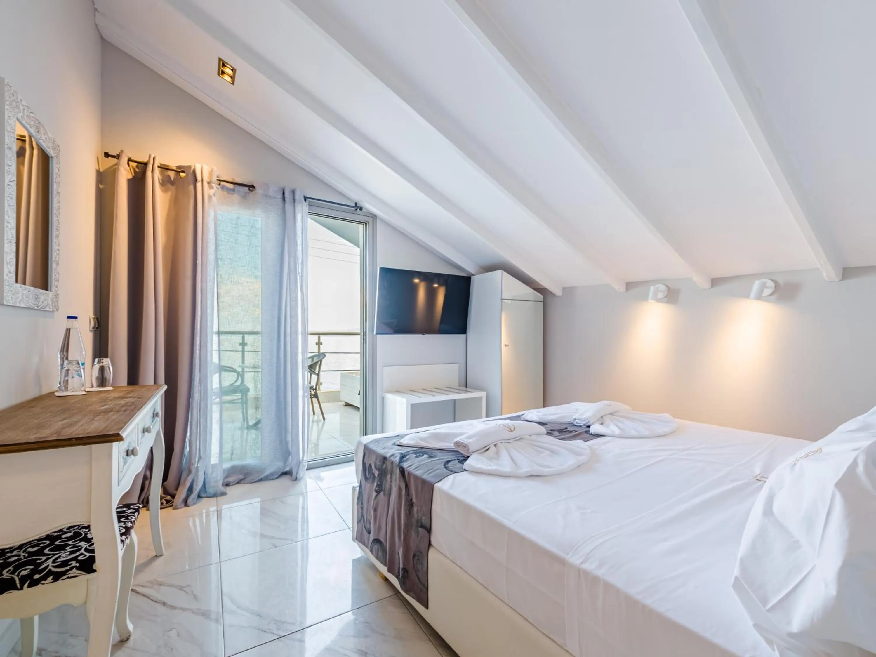 Photo of the whole room, Bed in Alpha Luxury Suites