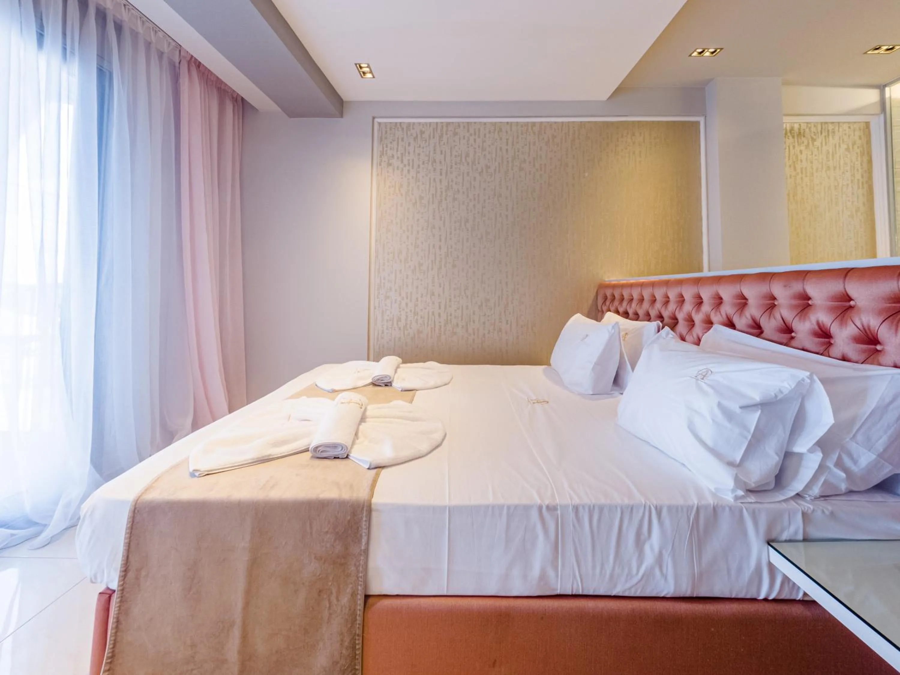 Photo of the whole room, Bed in Alpha Luxury Suites