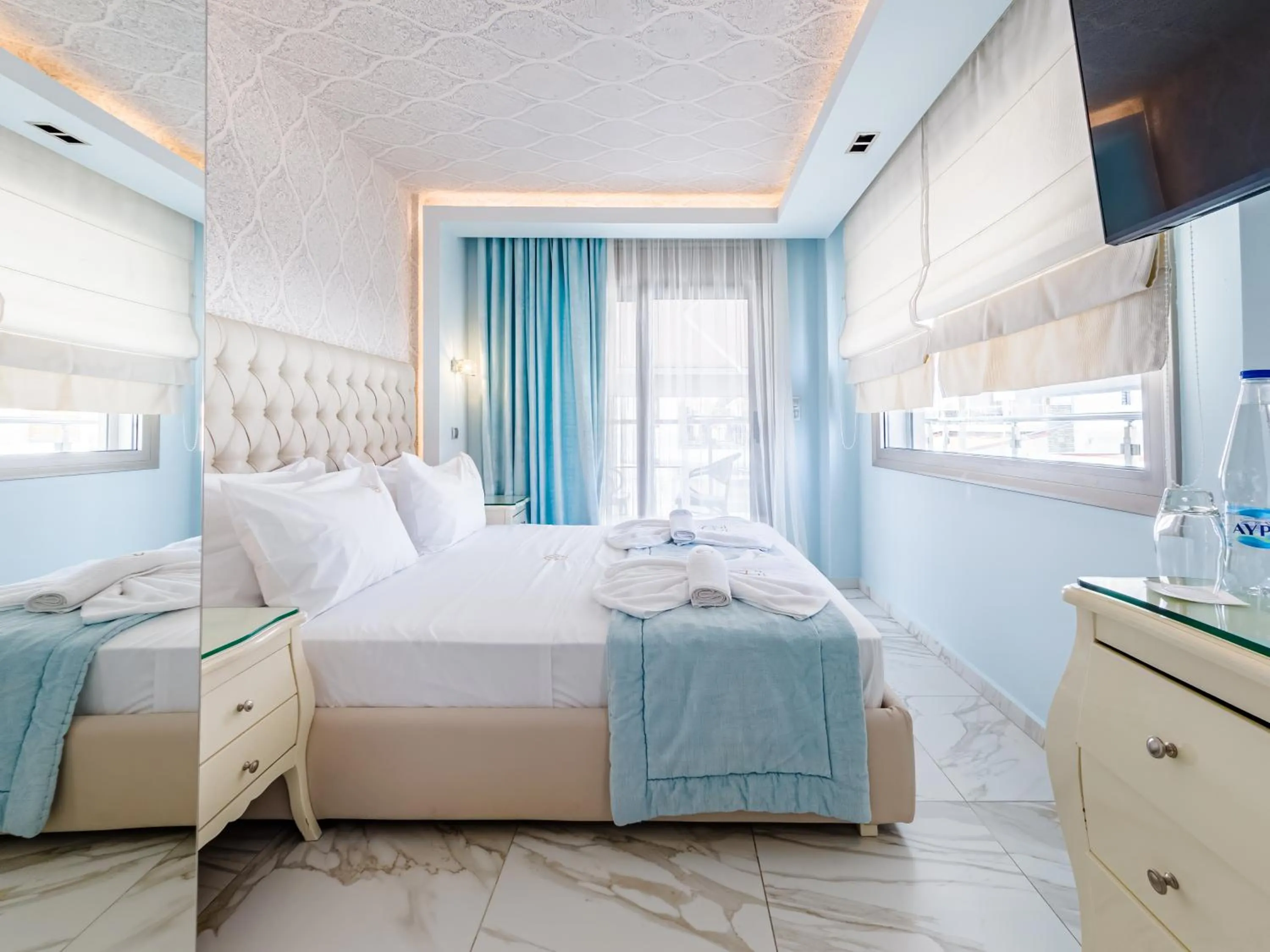 Bed in Alpha Luxury Suites