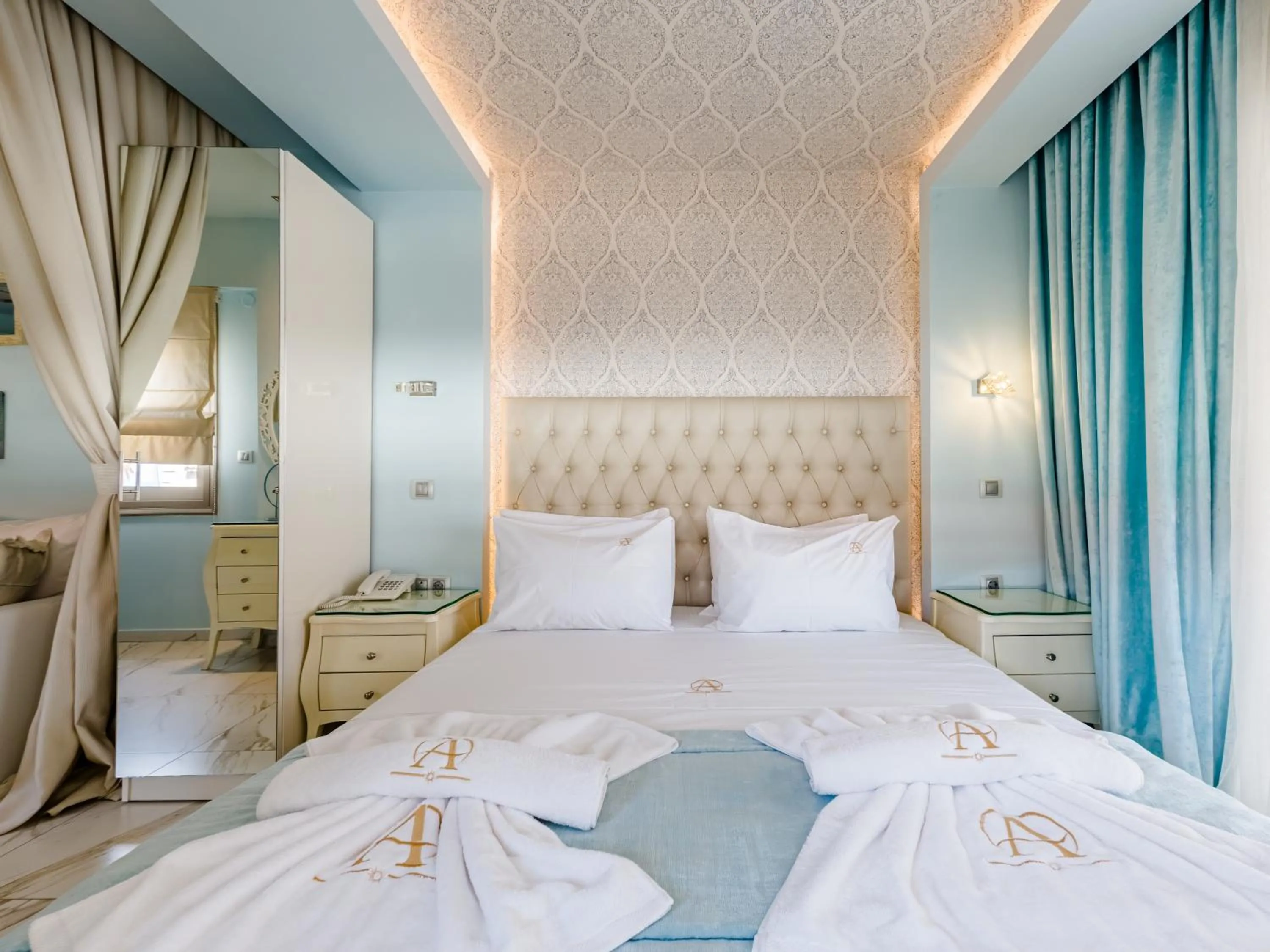 Bed in Alpha Luxury Suites