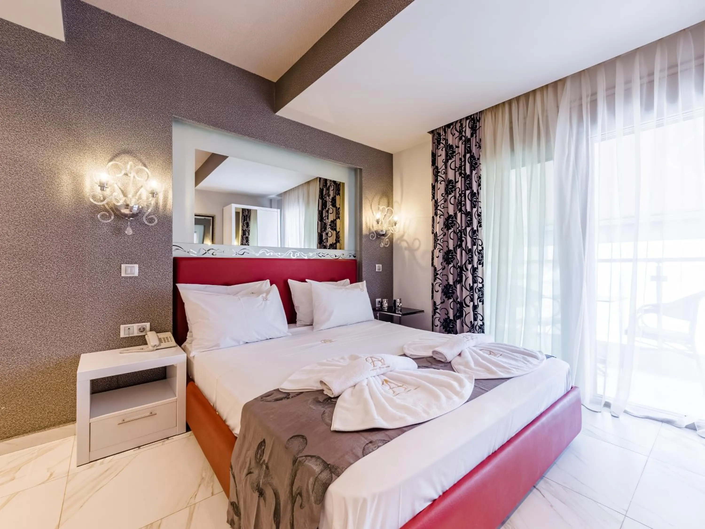 Bed in Alpha Luxury Suites