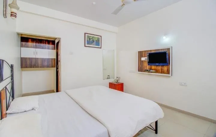 Bed in Girichintan Bunglow
