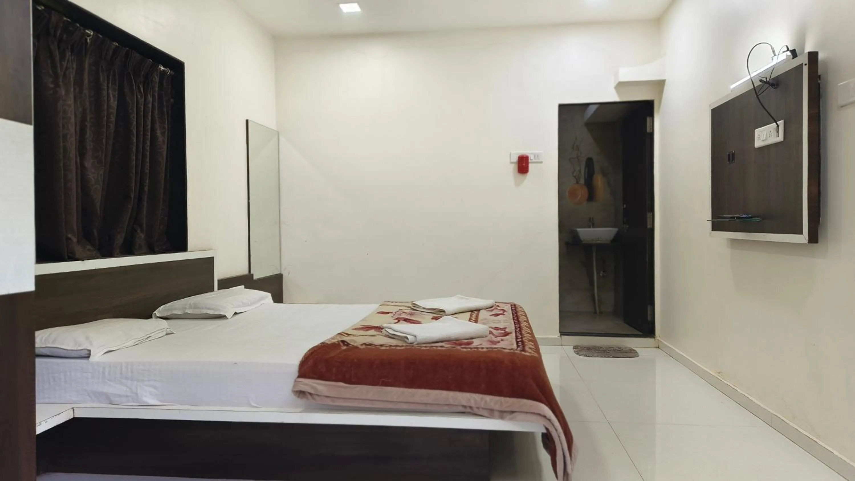 Bed in Girichintan Bunglow