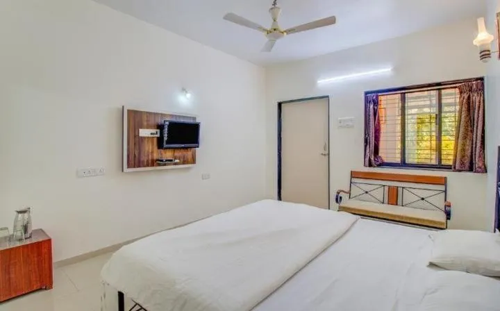 Bed in Girichintan Bunglow