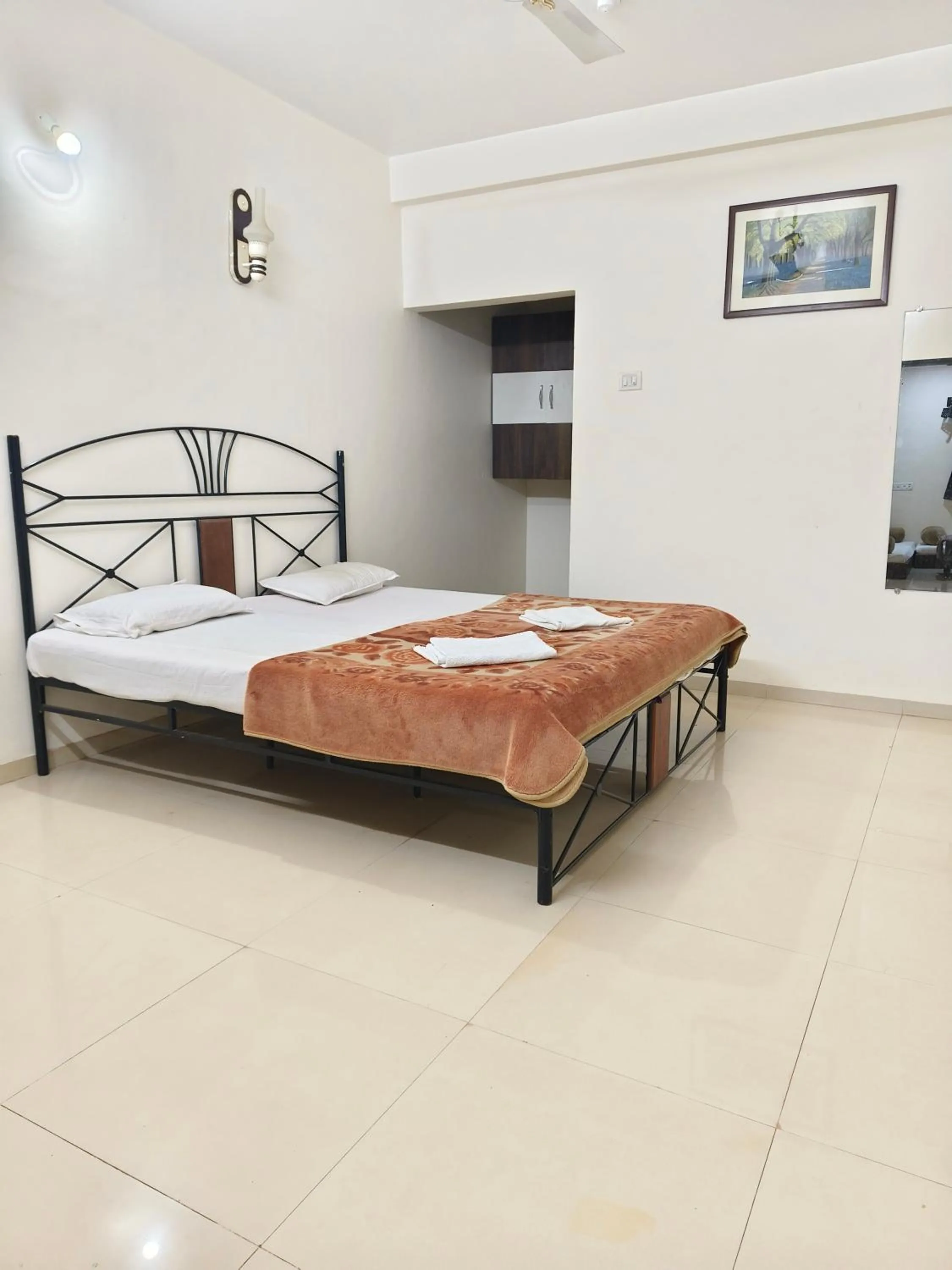 Bed in Girichintan Bunglow