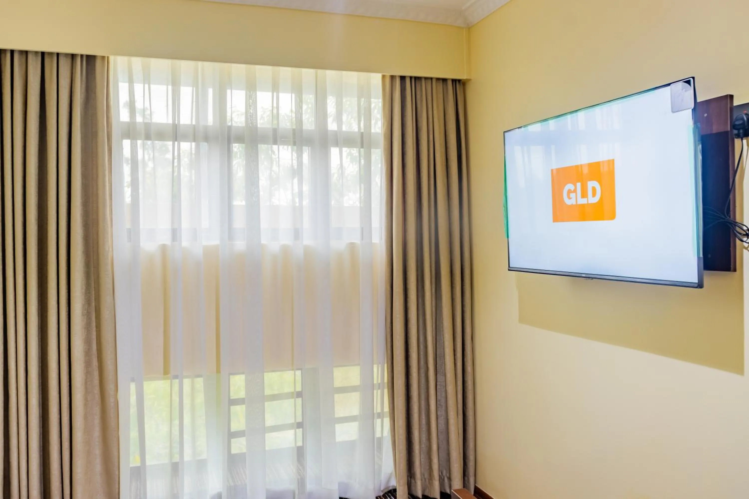 Communal lounge/ TV room in Karen Plains Hotel Nairobi