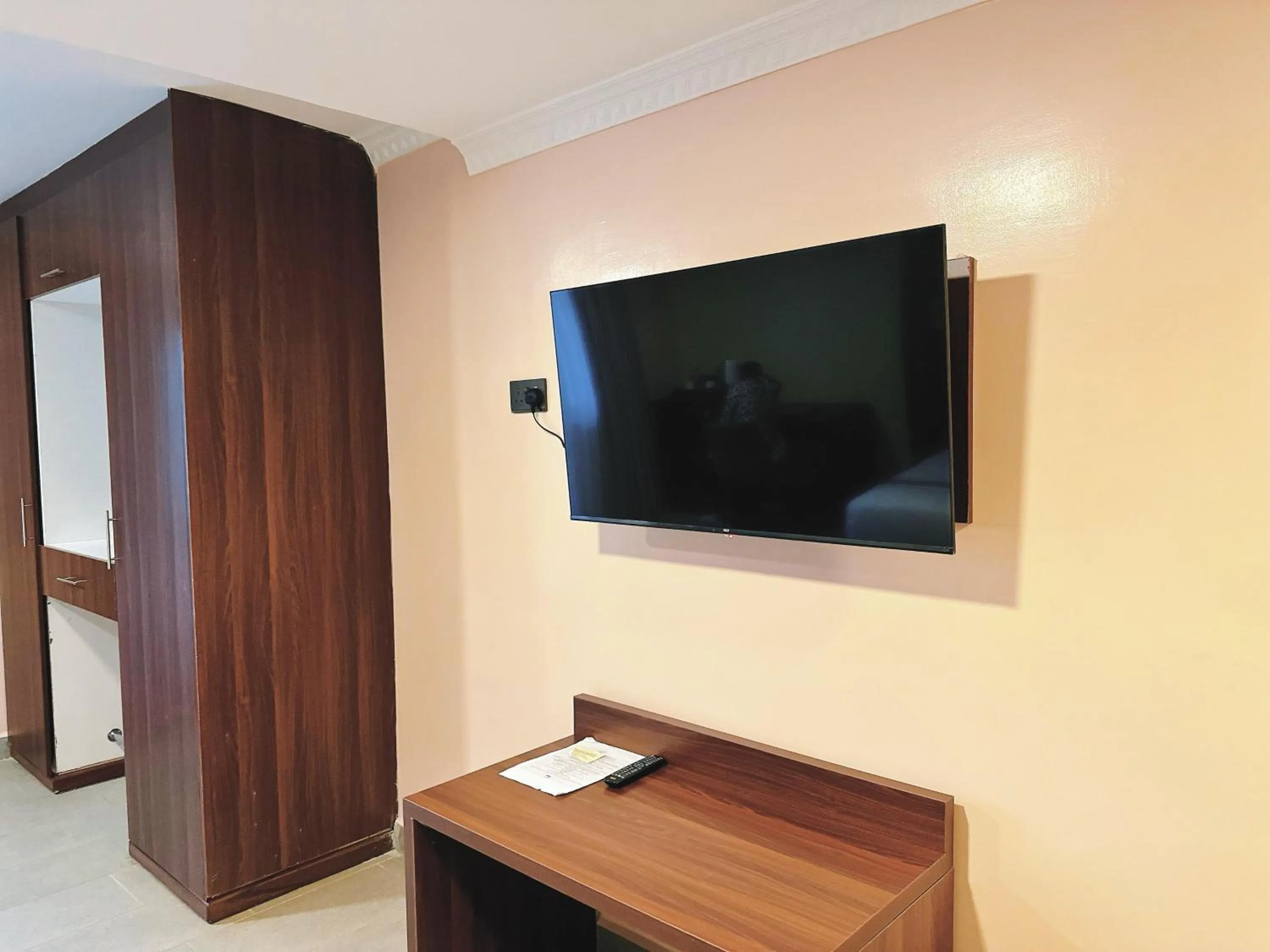 Communal lounge/ TV room in Karen Plains Hotel Nairobi