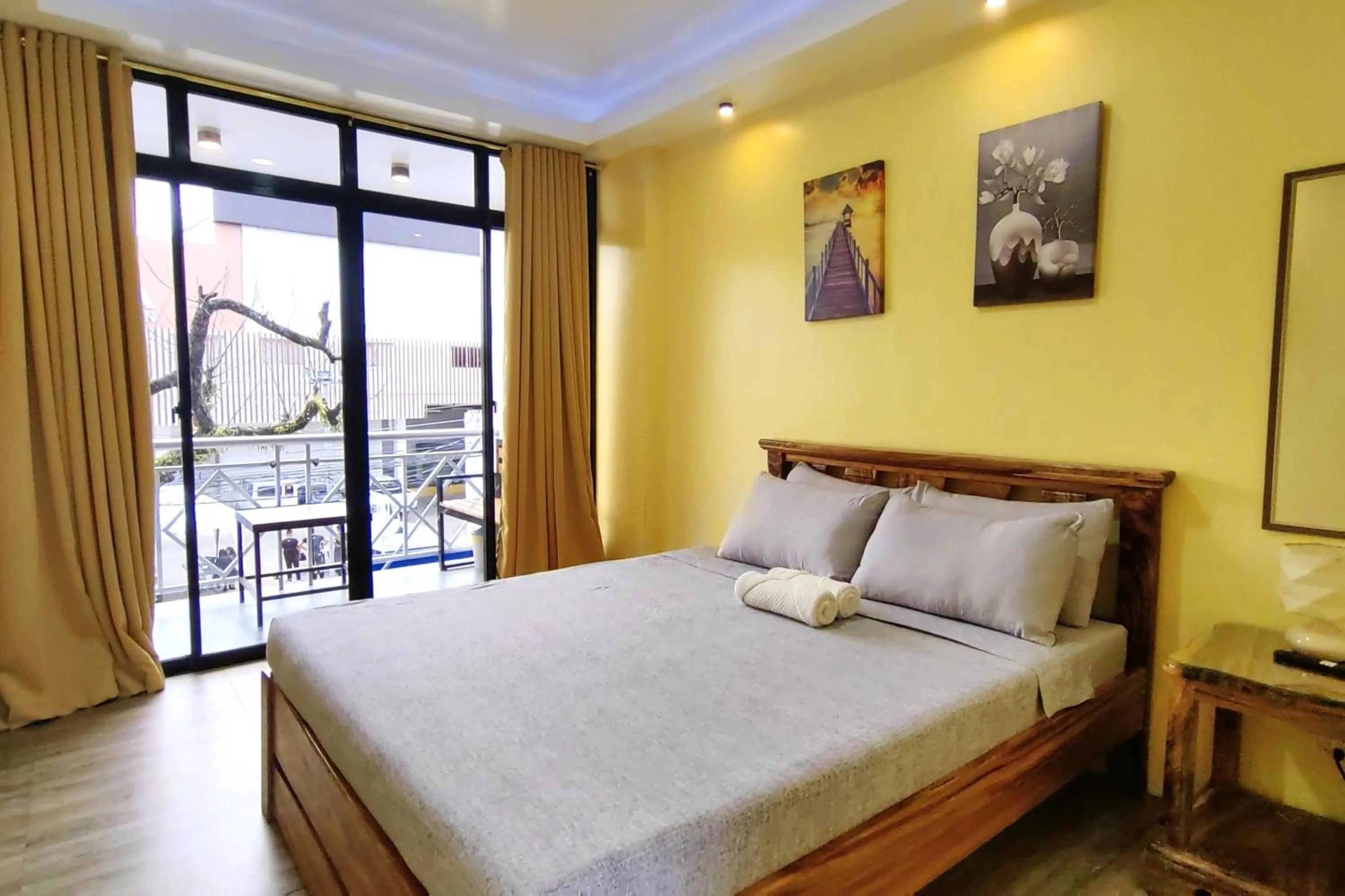 Bed in Inn Ka Kay Mame near SM City Puerto Princesa