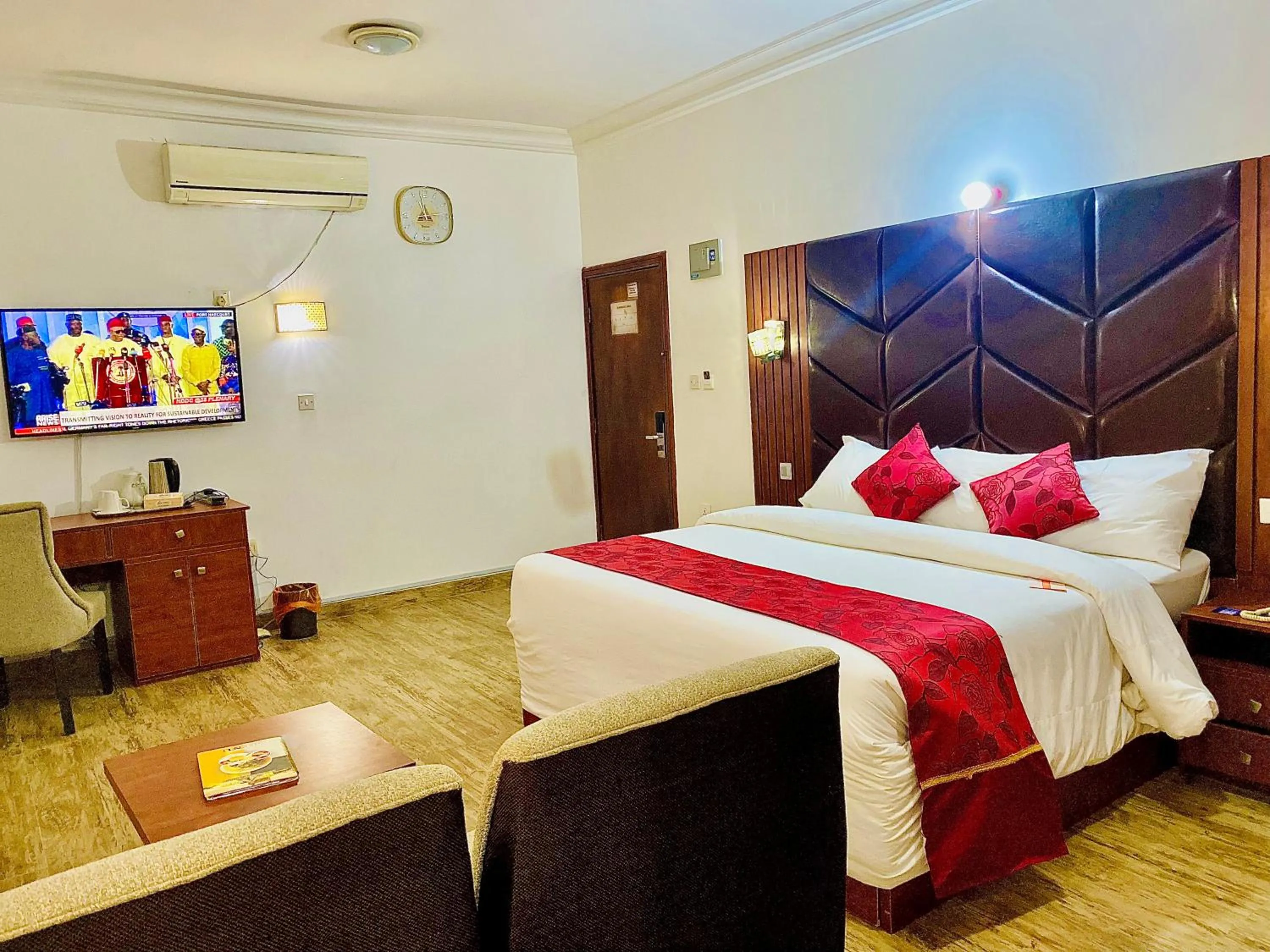 Communal lounge/ TV room, Bed in Reiz Continental Hotel, Abuja