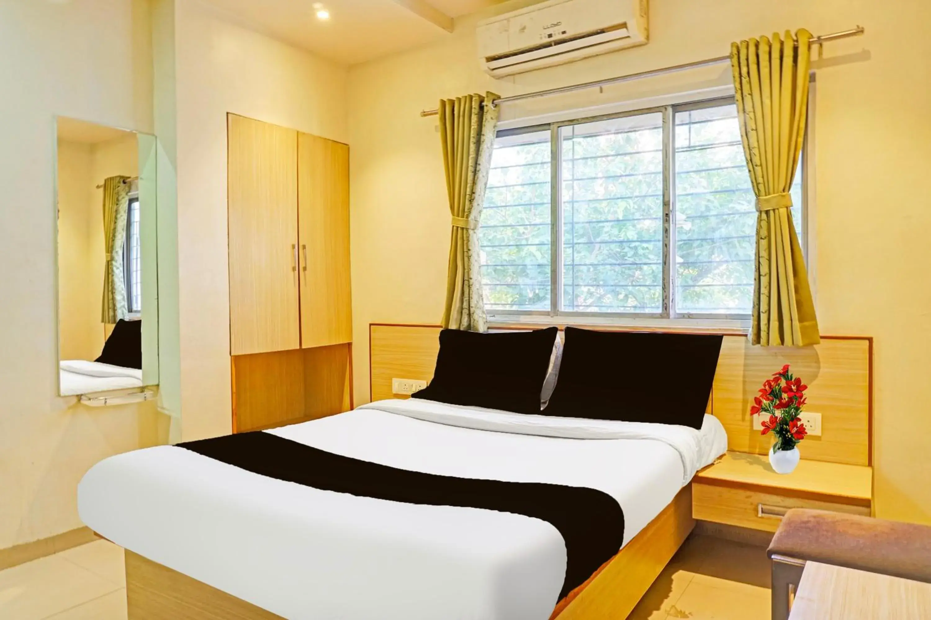 Classic Triple Room - single occupancy in Super Collection O Pune Nagar Road Viman Nagar Formerly Ananta Sagar Classic Triple Room - single occupancy in Super Collection O Pune Nagar Road Viman Nagar Formerly Ananta Sagar