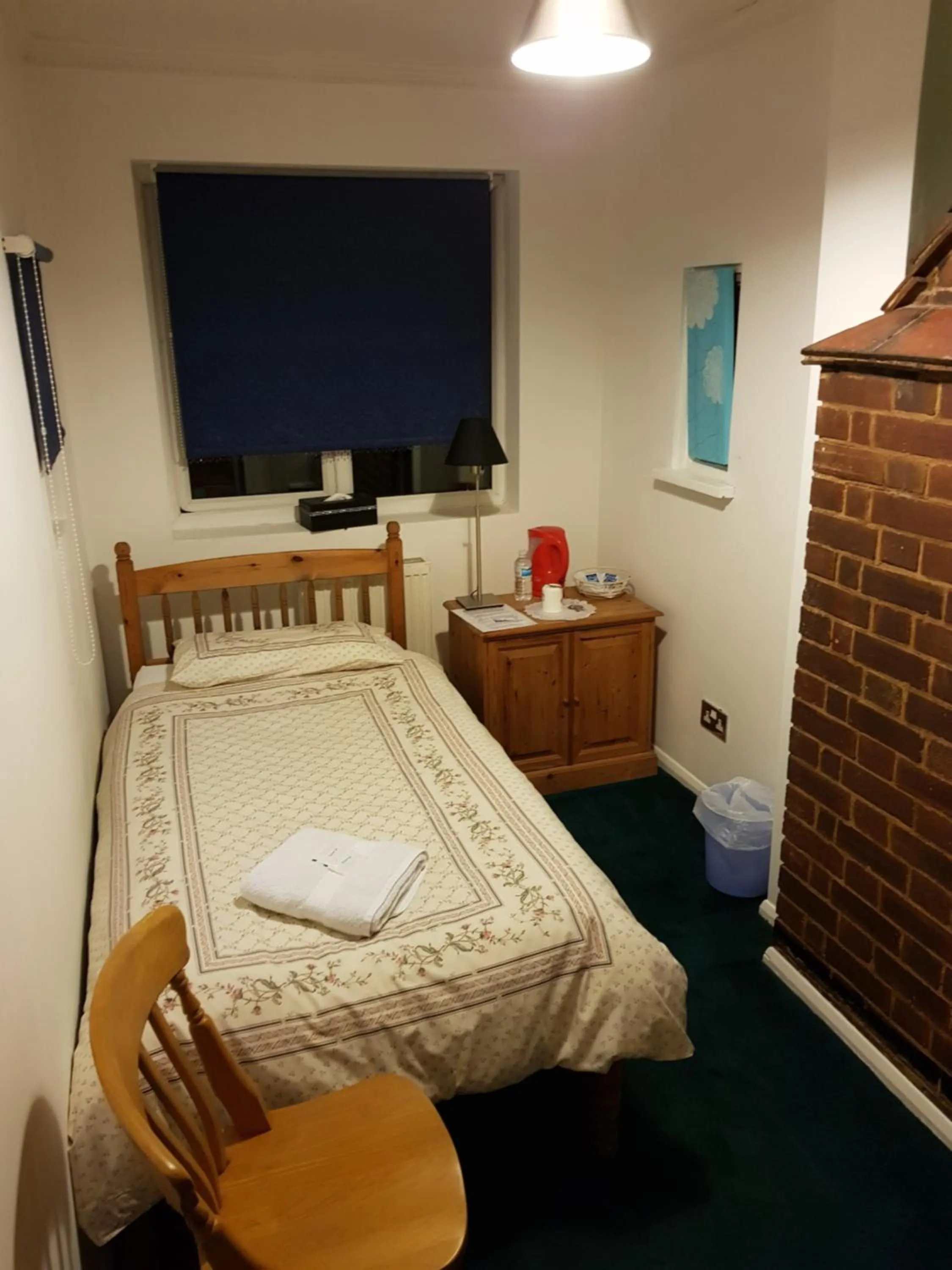 Bed in OYO Guest House Ellipse