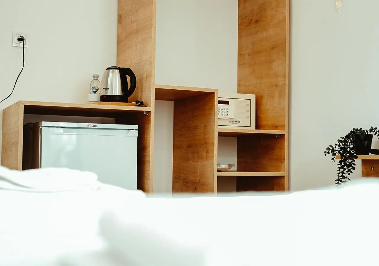 Kitchen or kitchenette, Bed in Deniz Otel