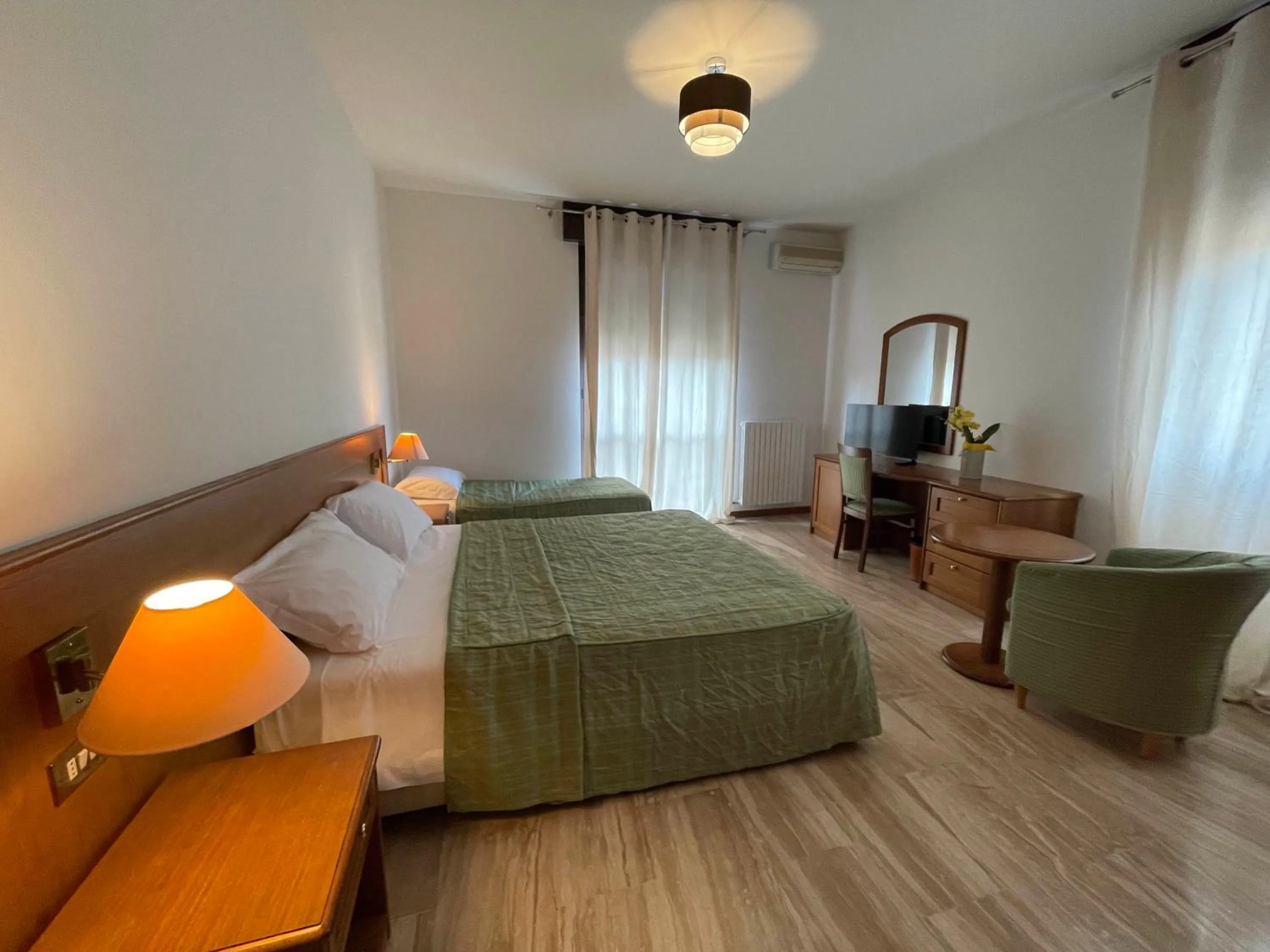 Bed in Hotel Clementi