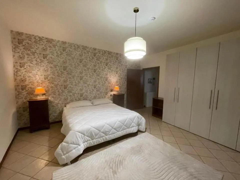 Bed in Hotel Clementi