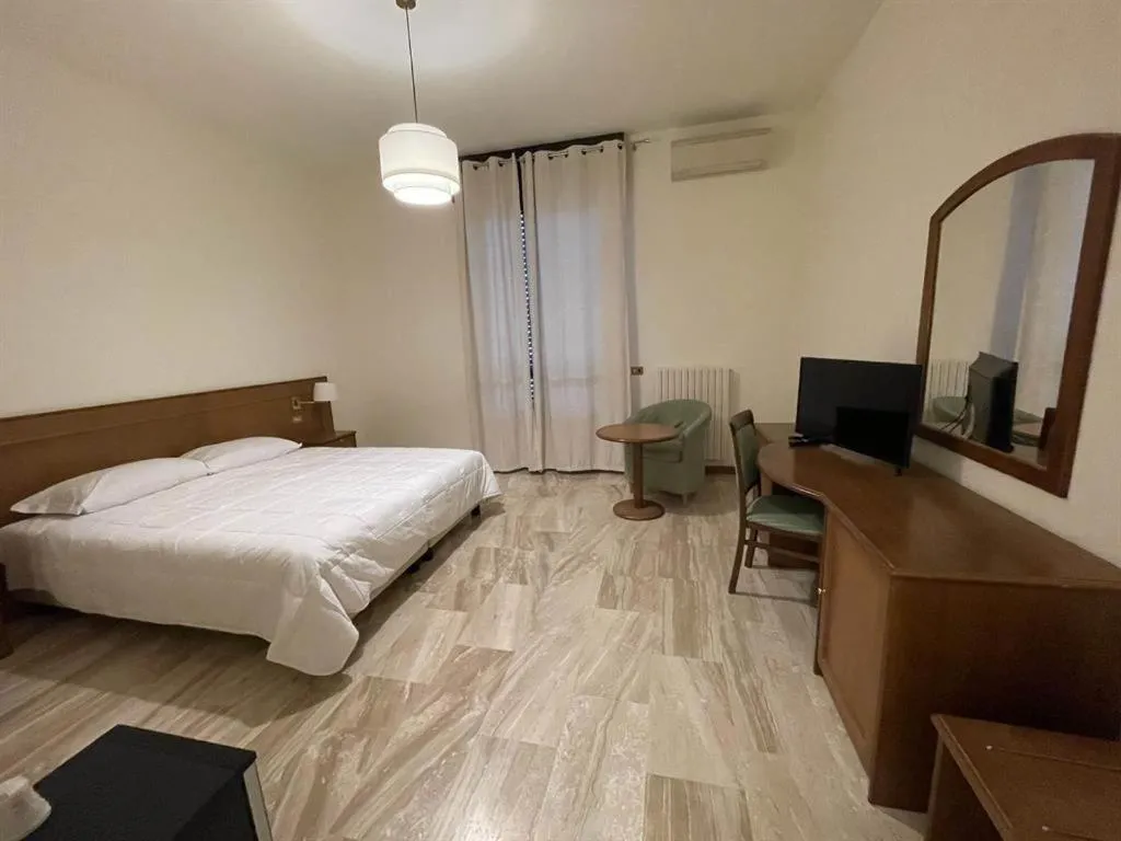 Bed in Hotel Clementi