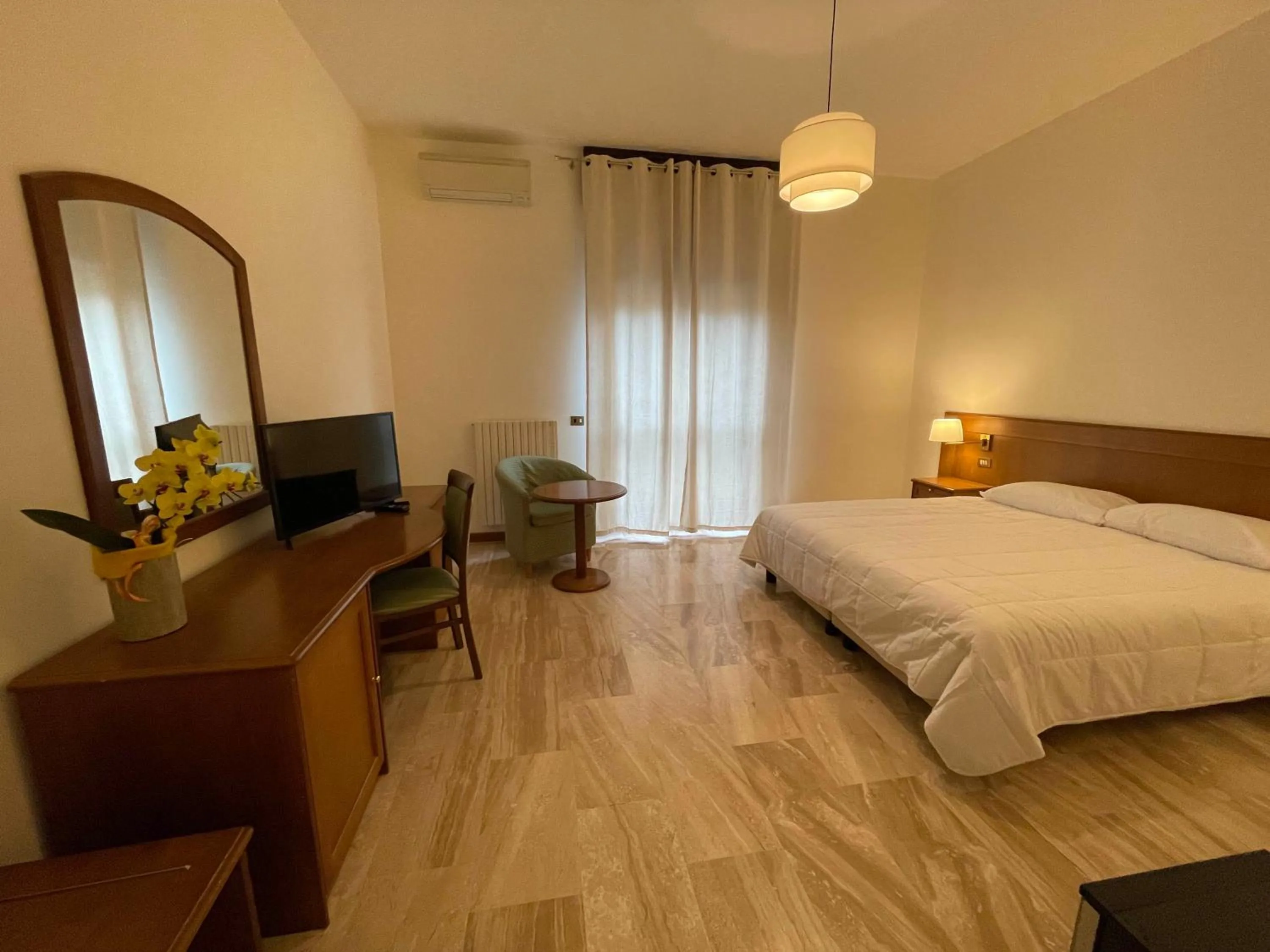 Bed in Hotel Clementi
