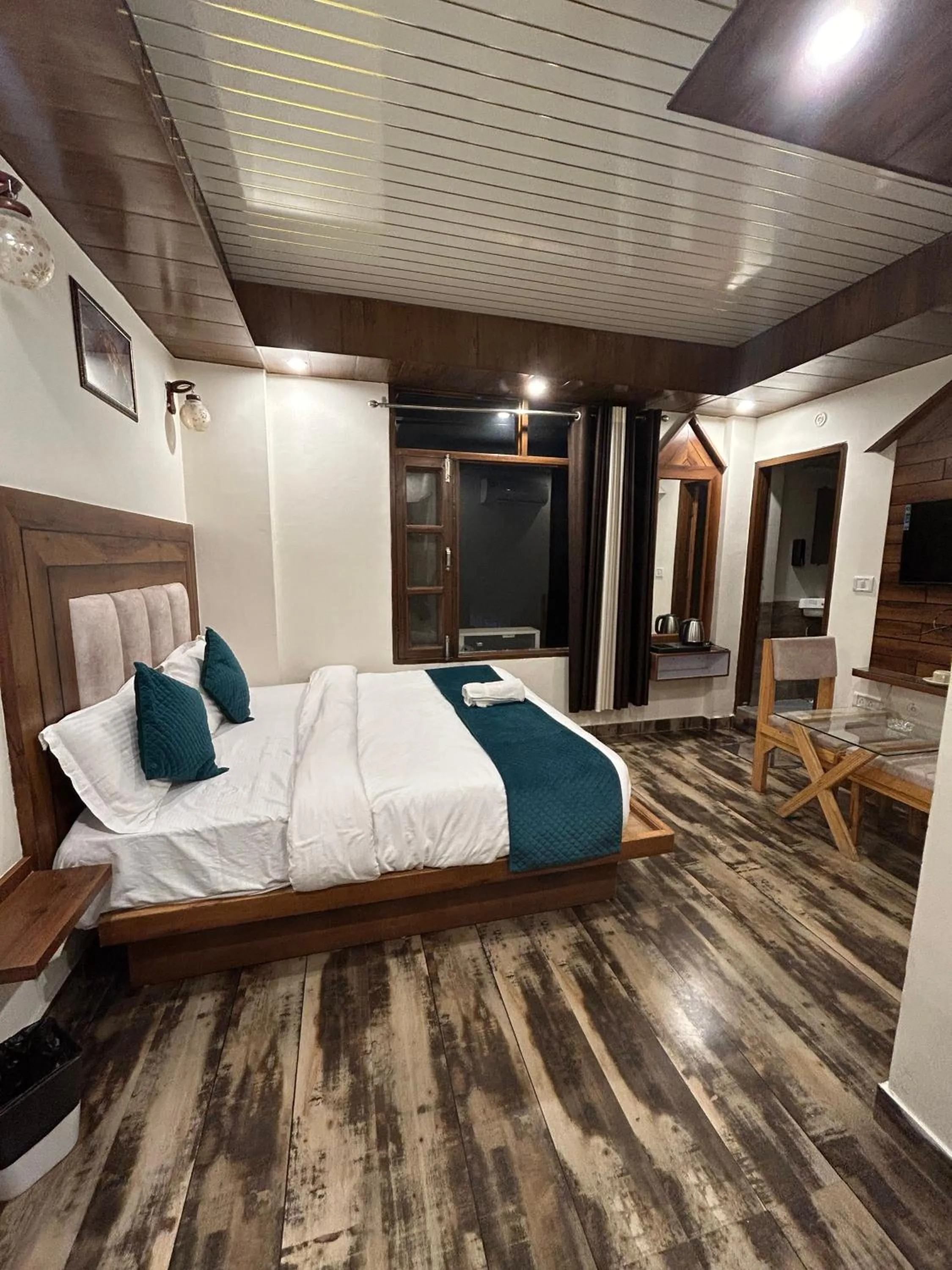 Photo of the whole room, Bed in Hotel Royal Orbit By Arony Hospitality Dehradun