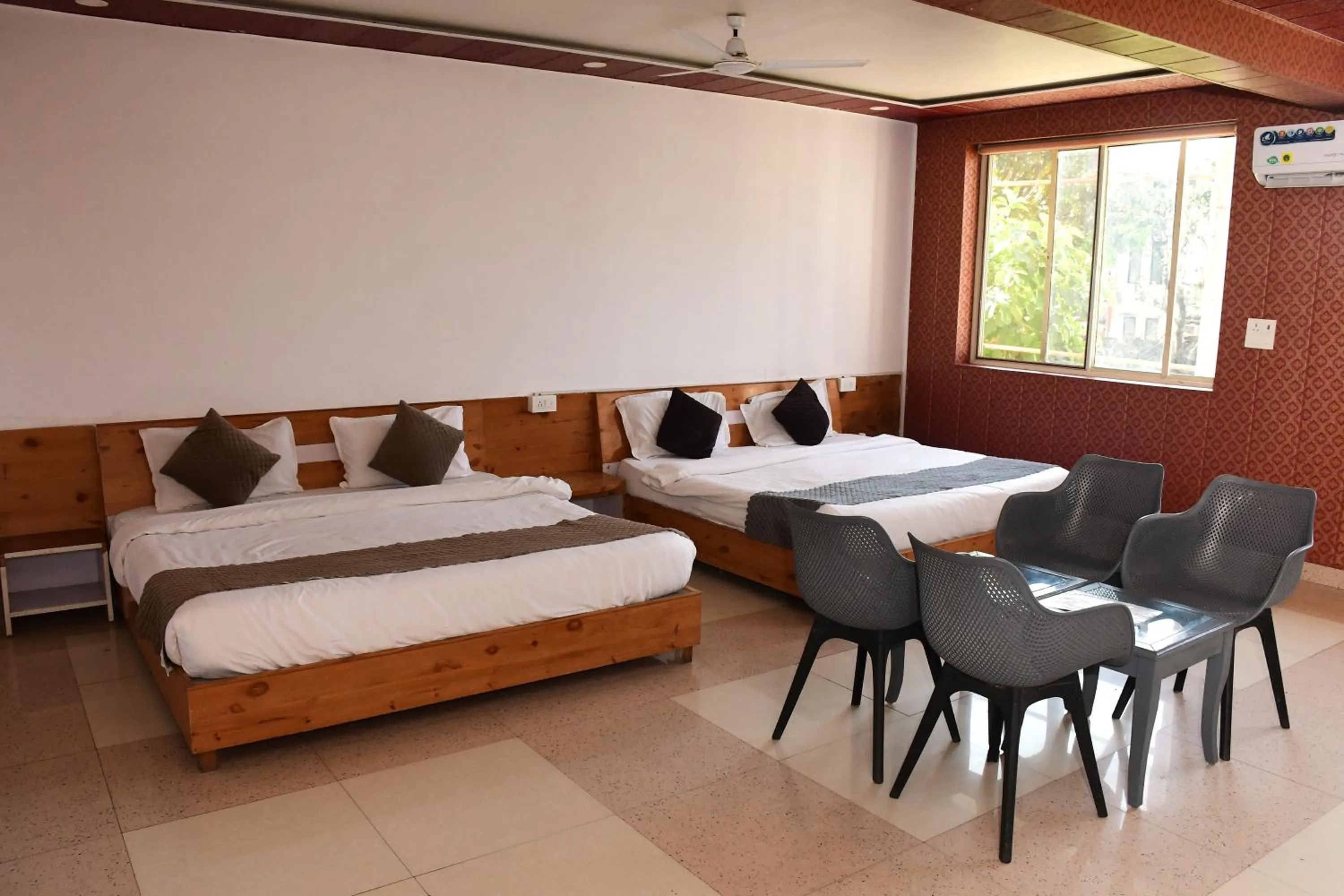 Bed in The Nature View Resort by Ohana