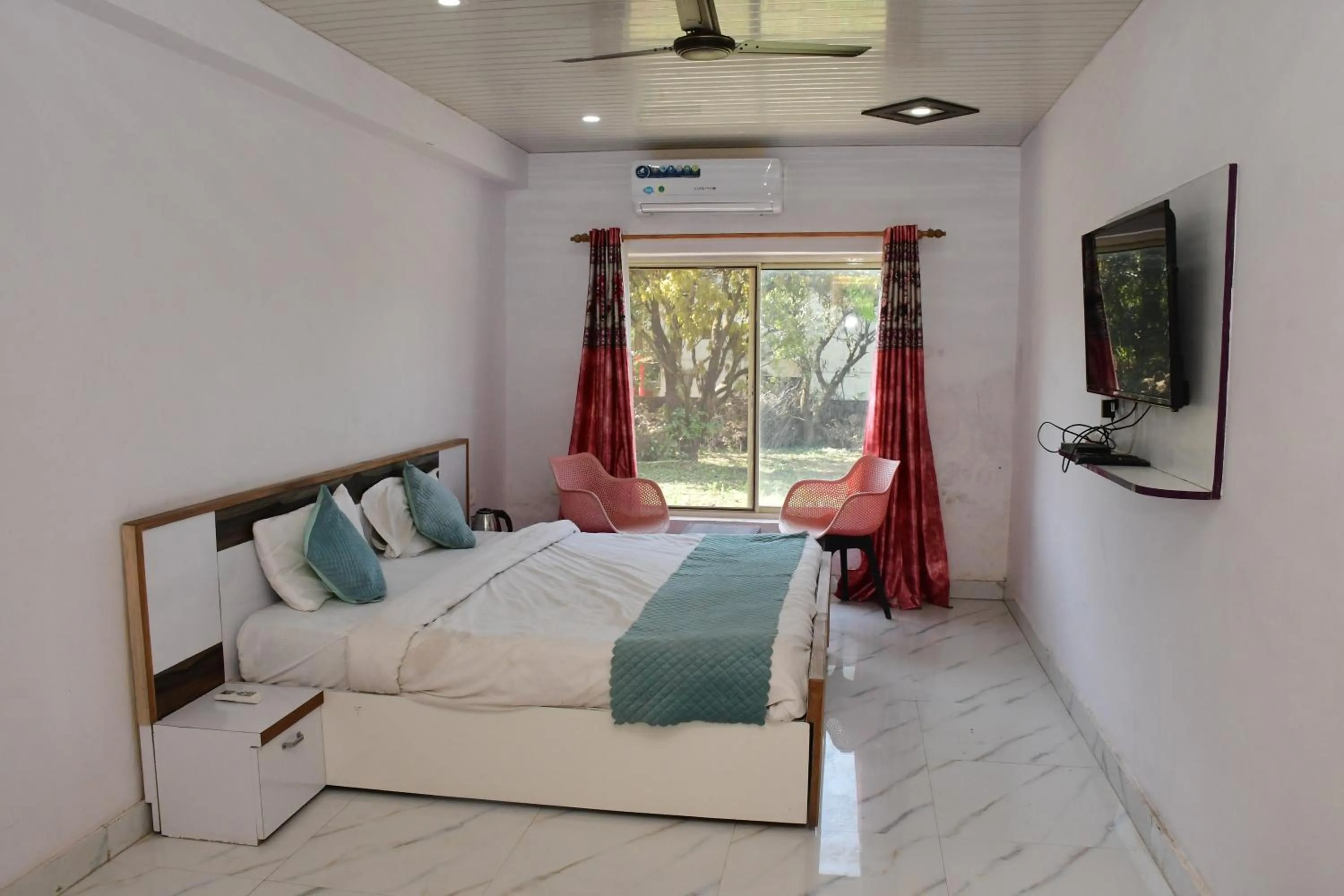 Bed in The Nature View Resort by Ohana