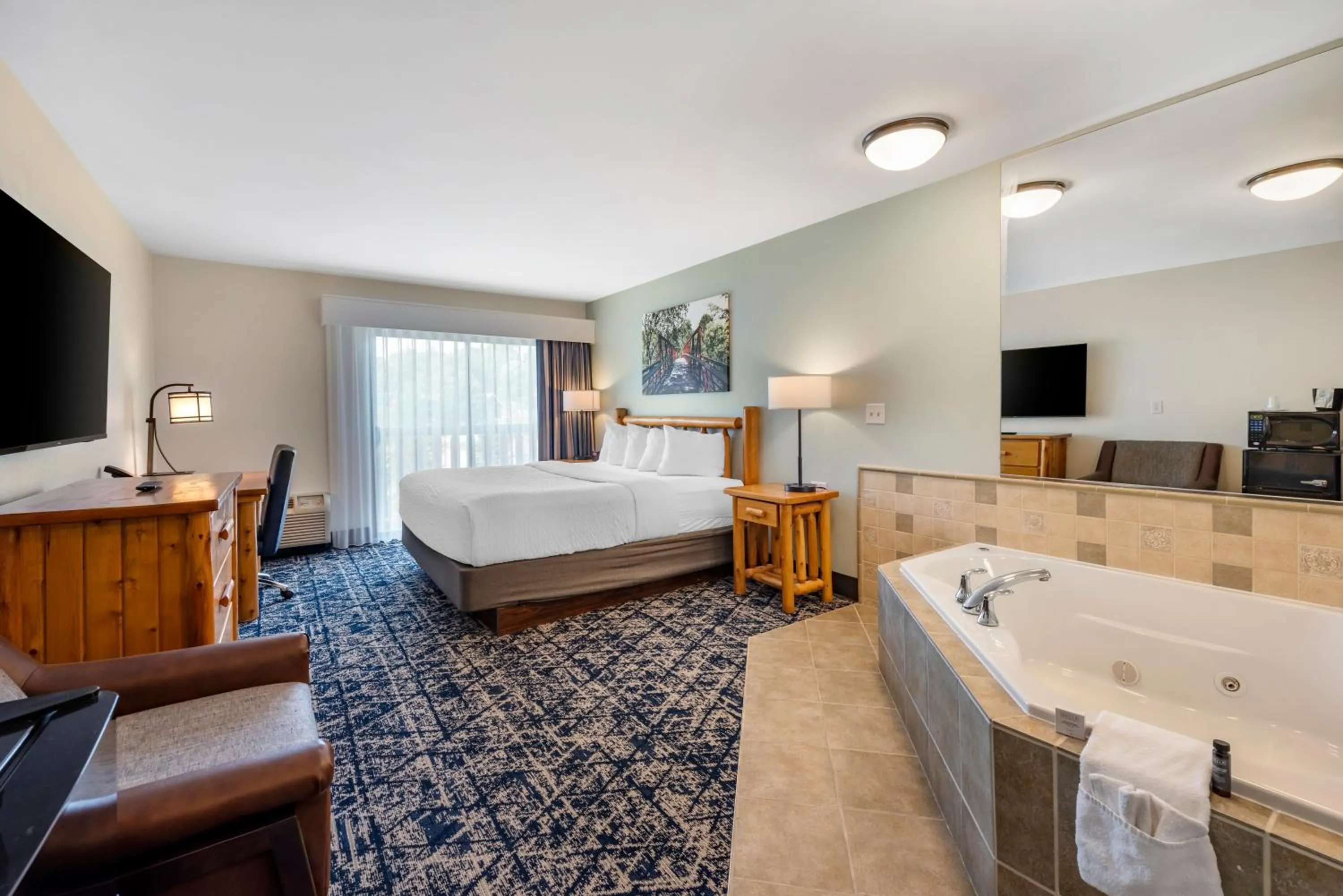 Hot Tub, Bed in Three Bears Resort Waterpark Near Tomah Ascend Collection