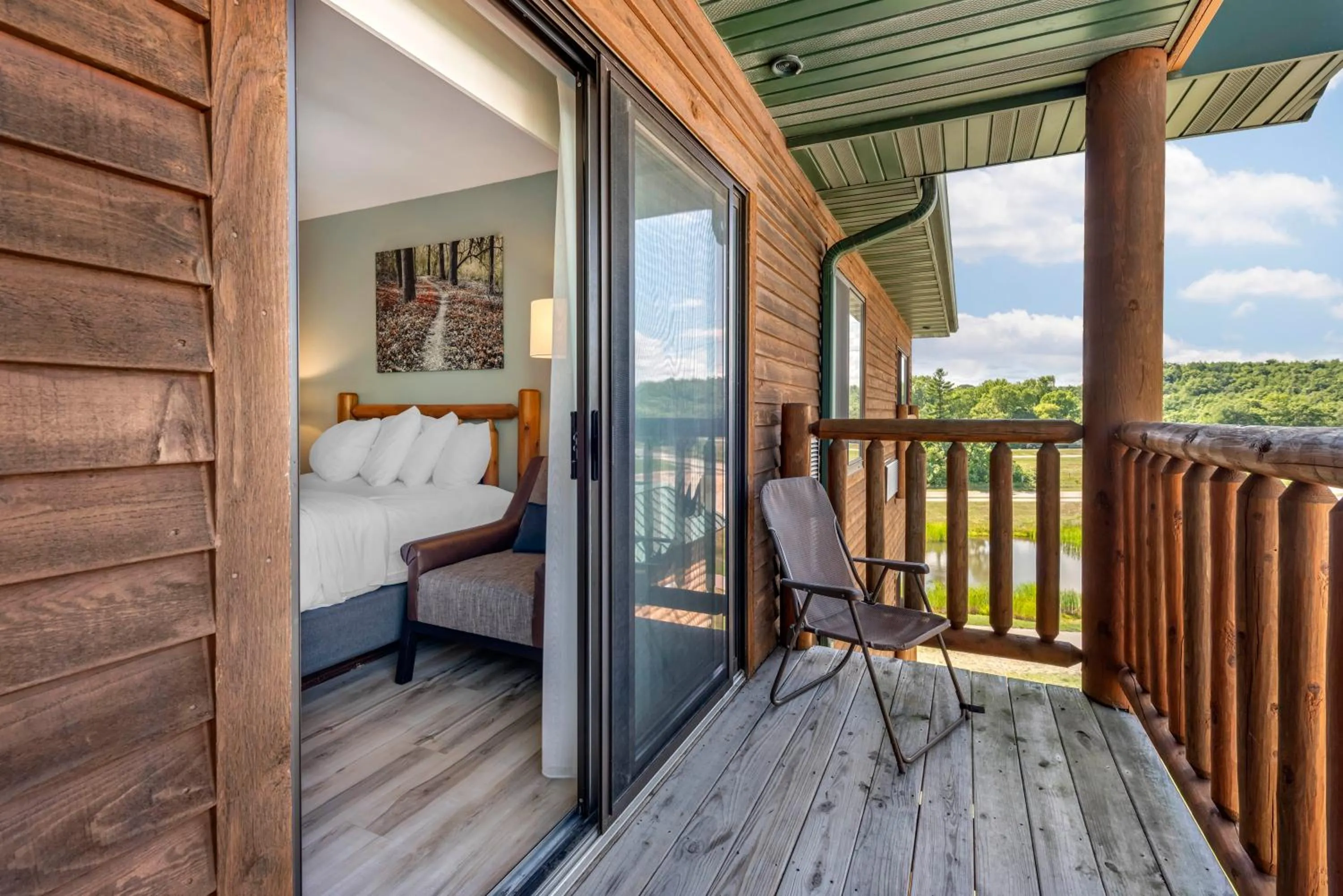 Patio, Bed in Three Bears Resort Waterpark Near Tomah Ascend Collection