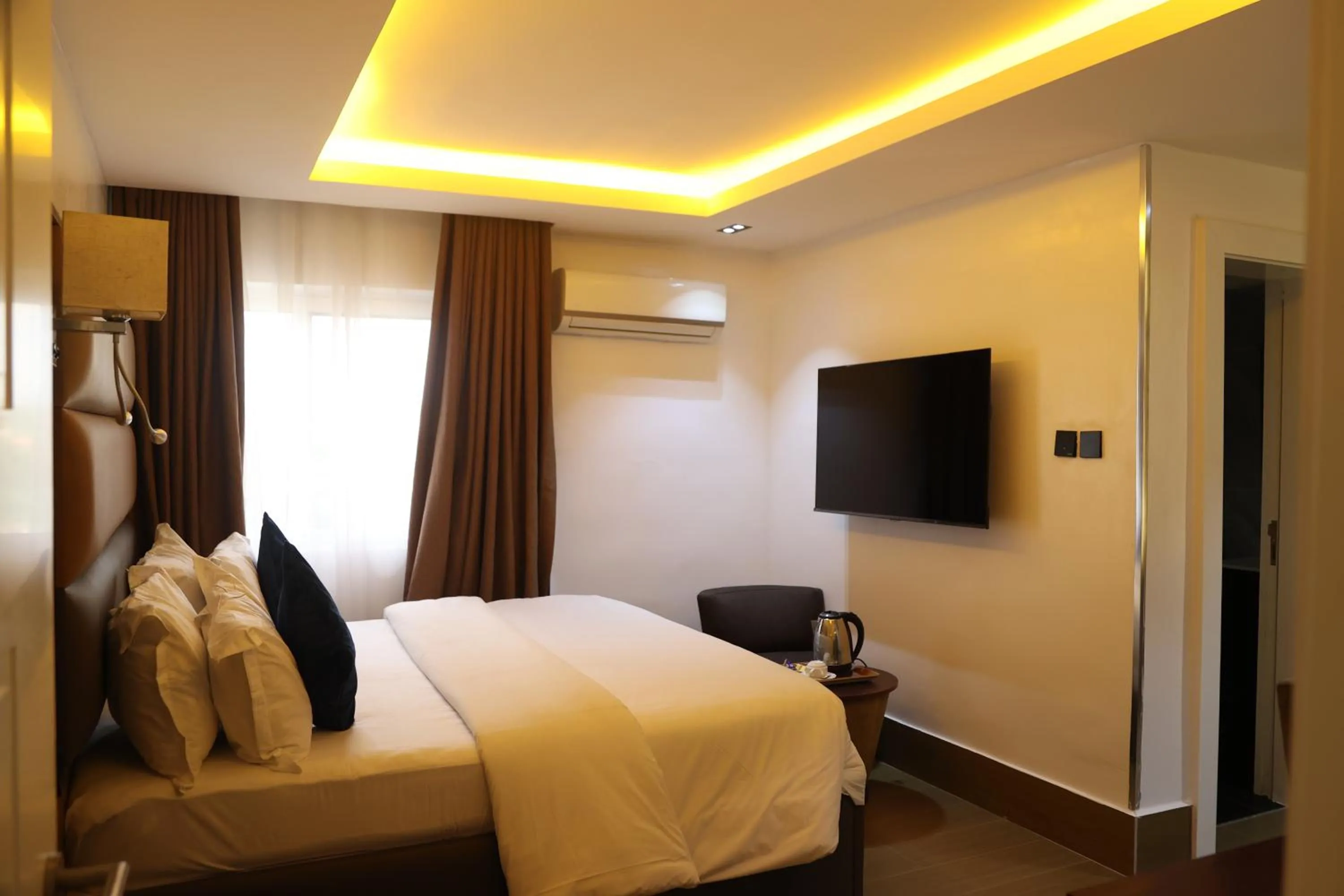 Bed in Bolton White Residence