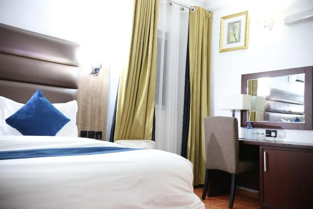 Bed in Bolton White Residence