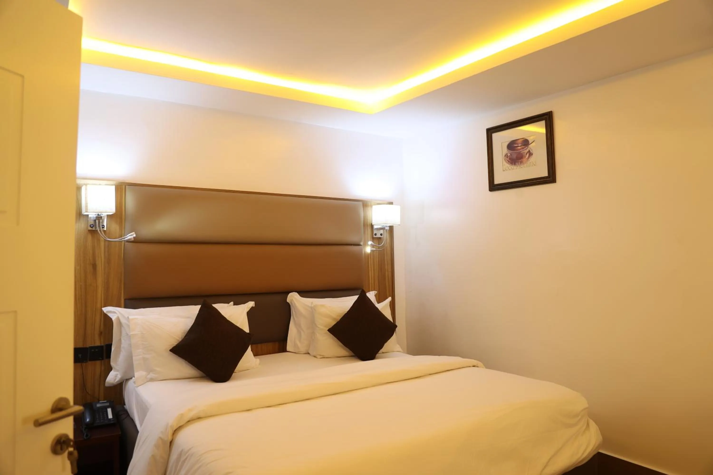 Bed in Bolton White Residence