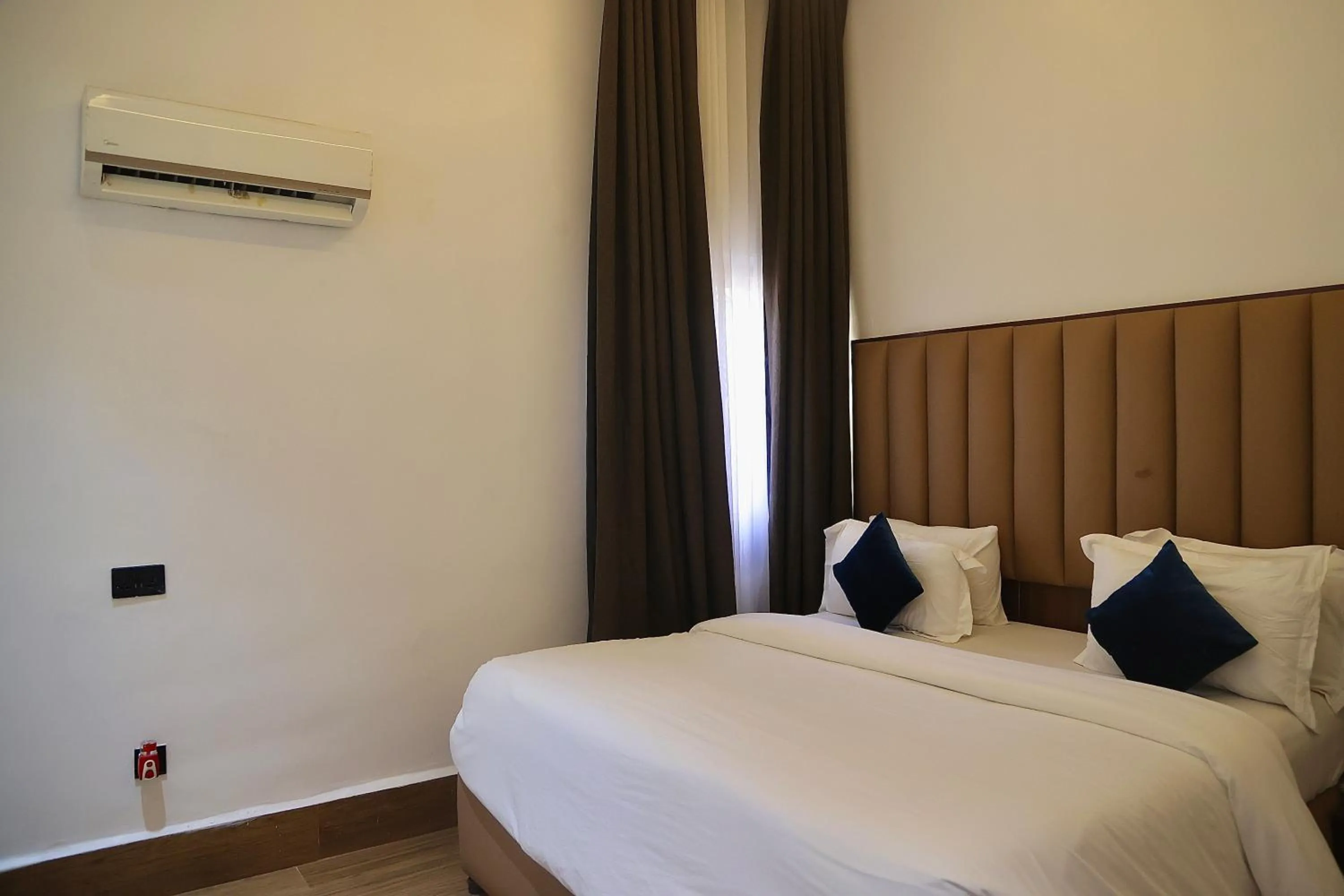 Bed in Bolton White Residence